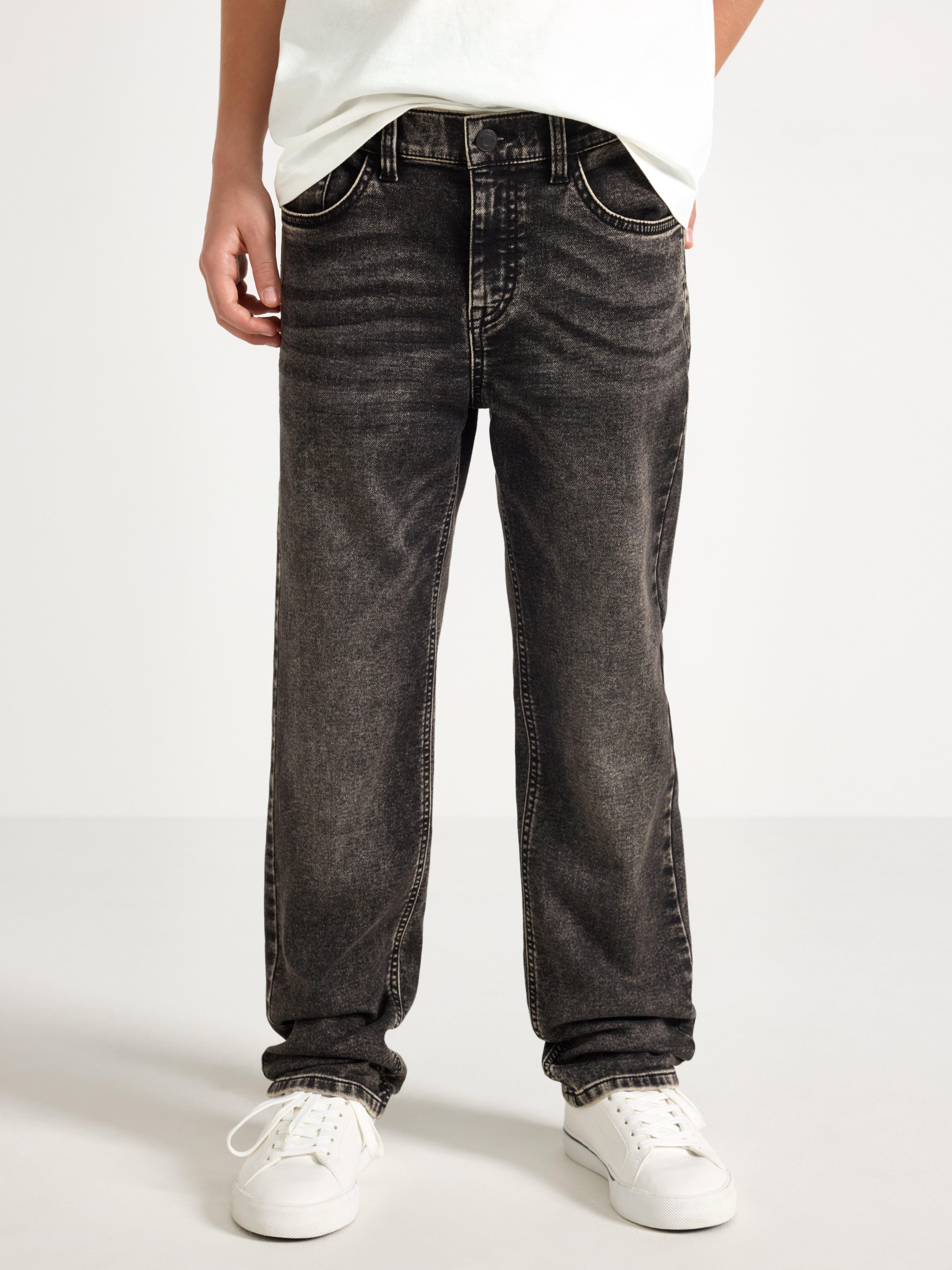 Pantalones vaqueros STAFFAN de punto súper elástico con pierna recta y cintura normal, color negro.