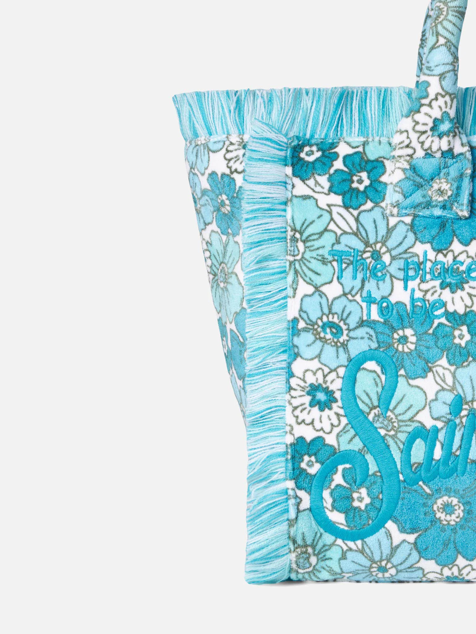 Bolsa de ombro estilo vanity em tecido esponja com estampa floral.