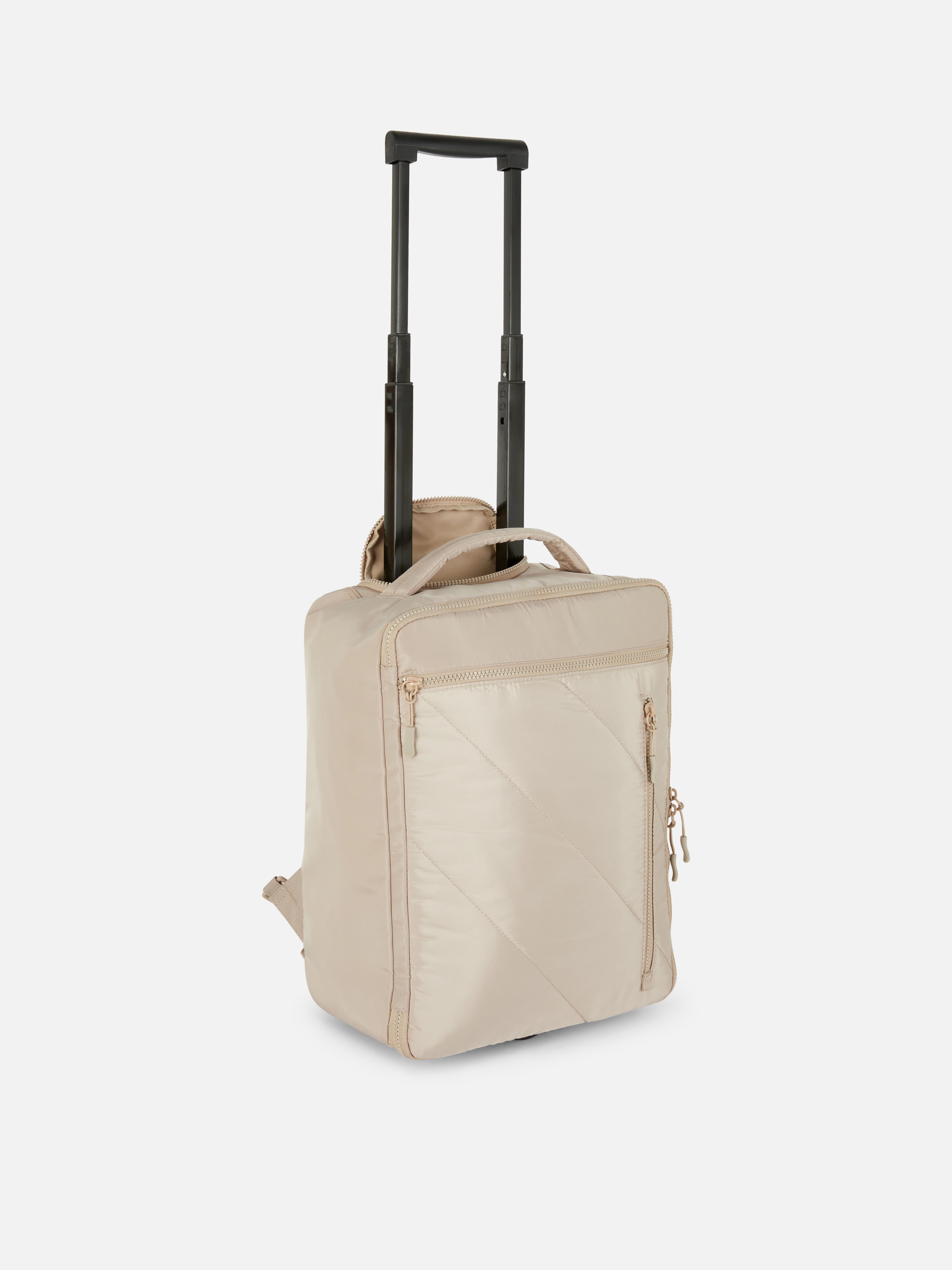 Rucsac tip troleu Un rucsac tip troleu cu compartimente multiple de depozitare, plus un mâner extensibil și roți