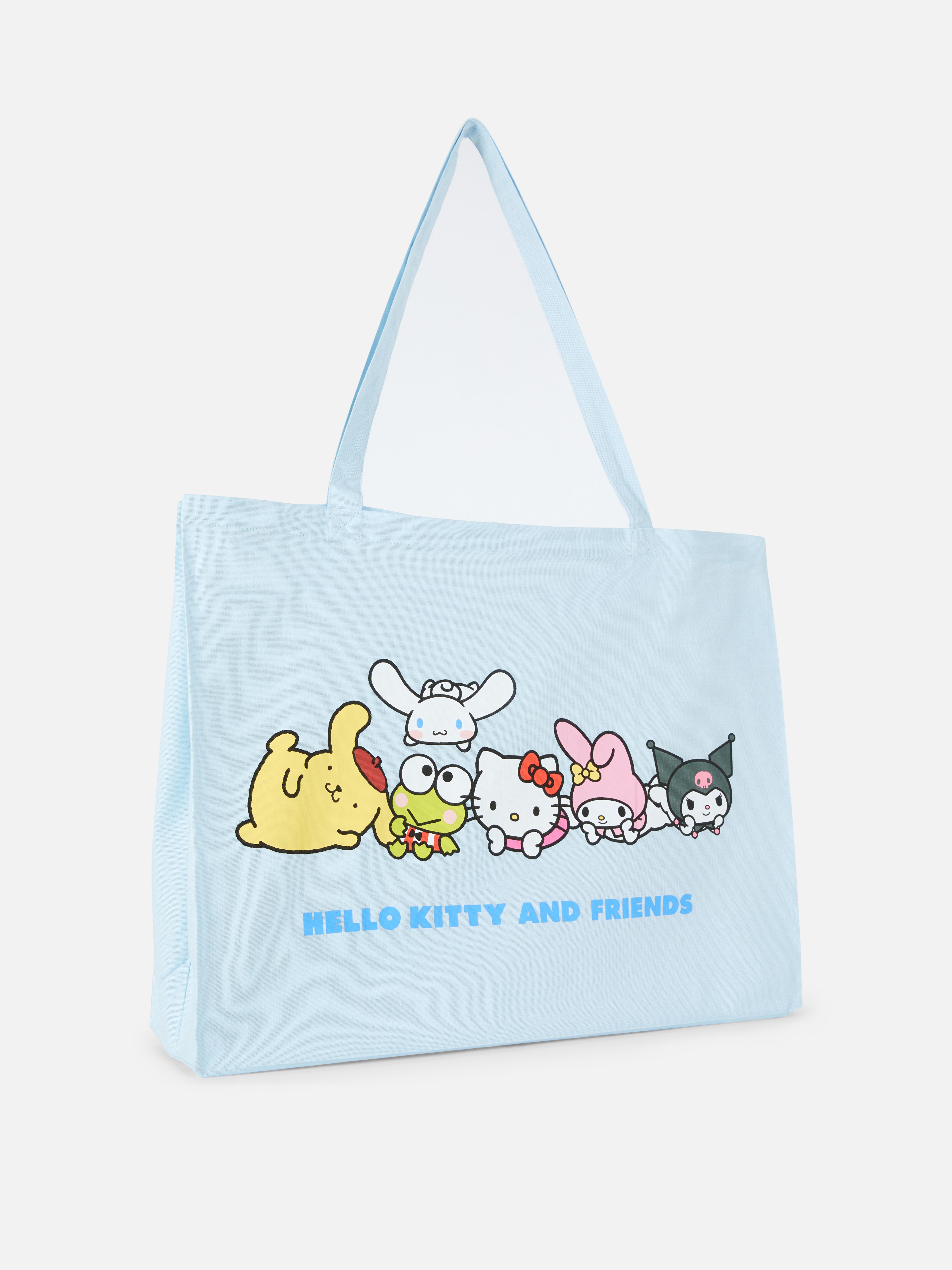 Geantă tote extra mare cu Hello Kitty și prietenii. O geantă tote din pânză cu bretele de umăr și personaje Sanrio.