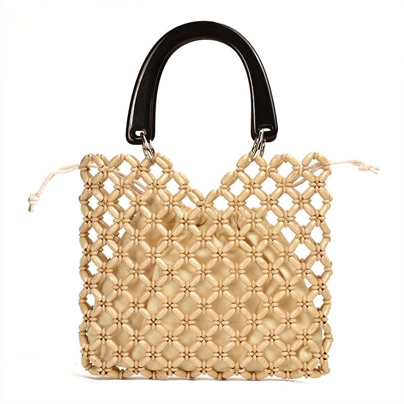 Sac à bandoulière en bois tressé à la main, orné de perles de bois. Sac cabas original pour femme.