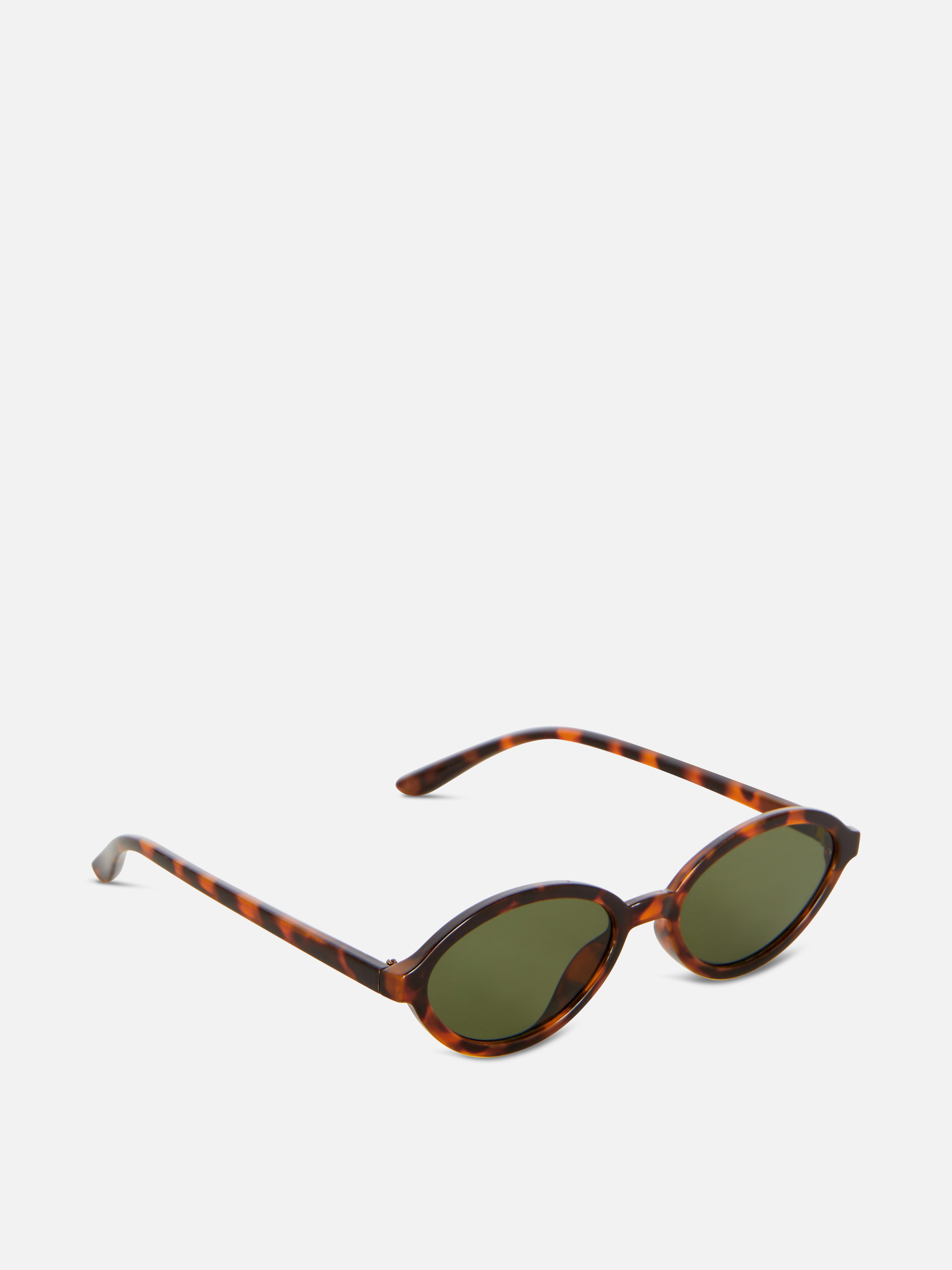 Ochelari de soare ovali, model ajustat. Ochelari de soare ovali cu ramă subțire și lentile colorate, în stilul anilor '90.
