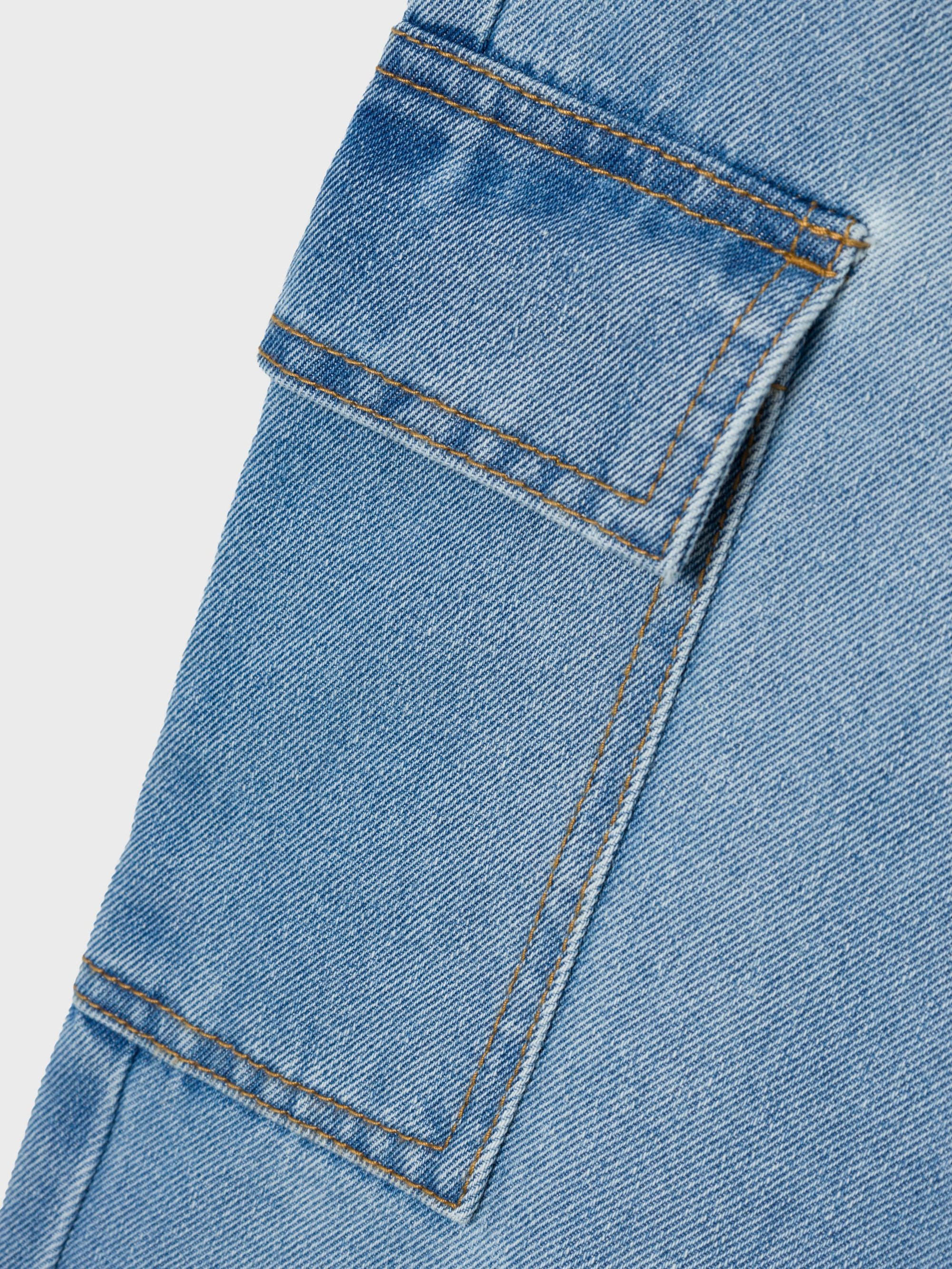 Noem het NKFROSE WIDE - Flared Jeans - lichtblauwe denim
