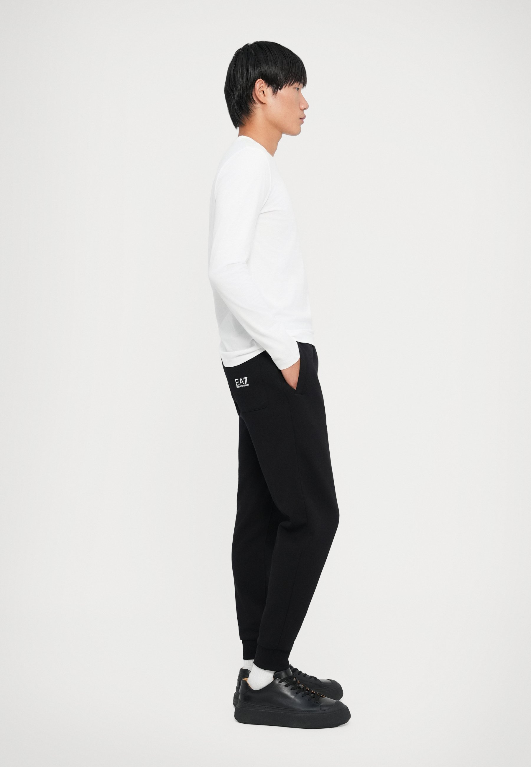 Pantalon de survêtement EA7 Emporio Armani TRAIN LOGO SERIES - Noir/Blanc