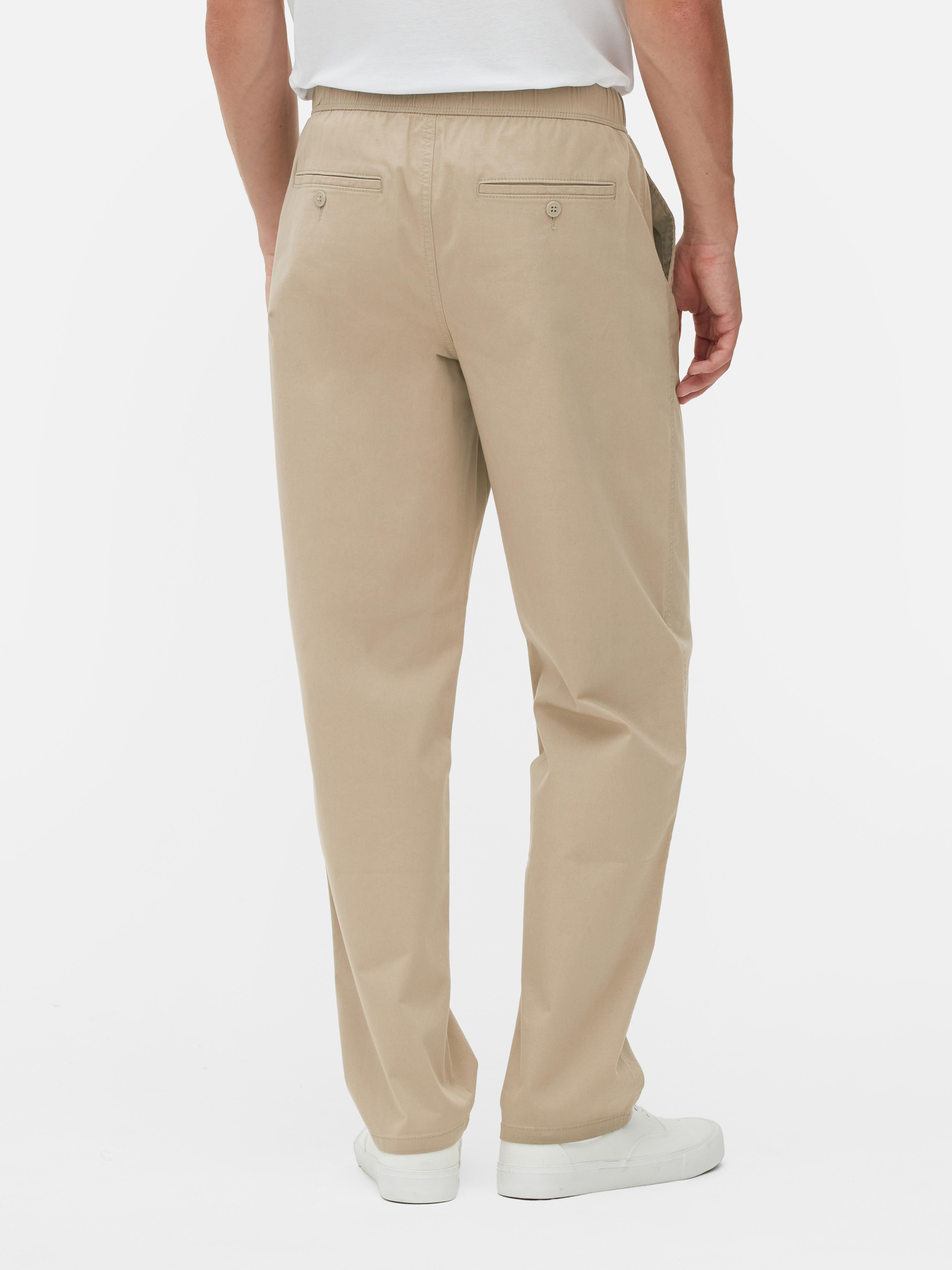 Pantaloni cu talie elastică. Acești pantaloni eleganți cu talie elastică sunt extrem de confortabili și se potrivesc perfect.