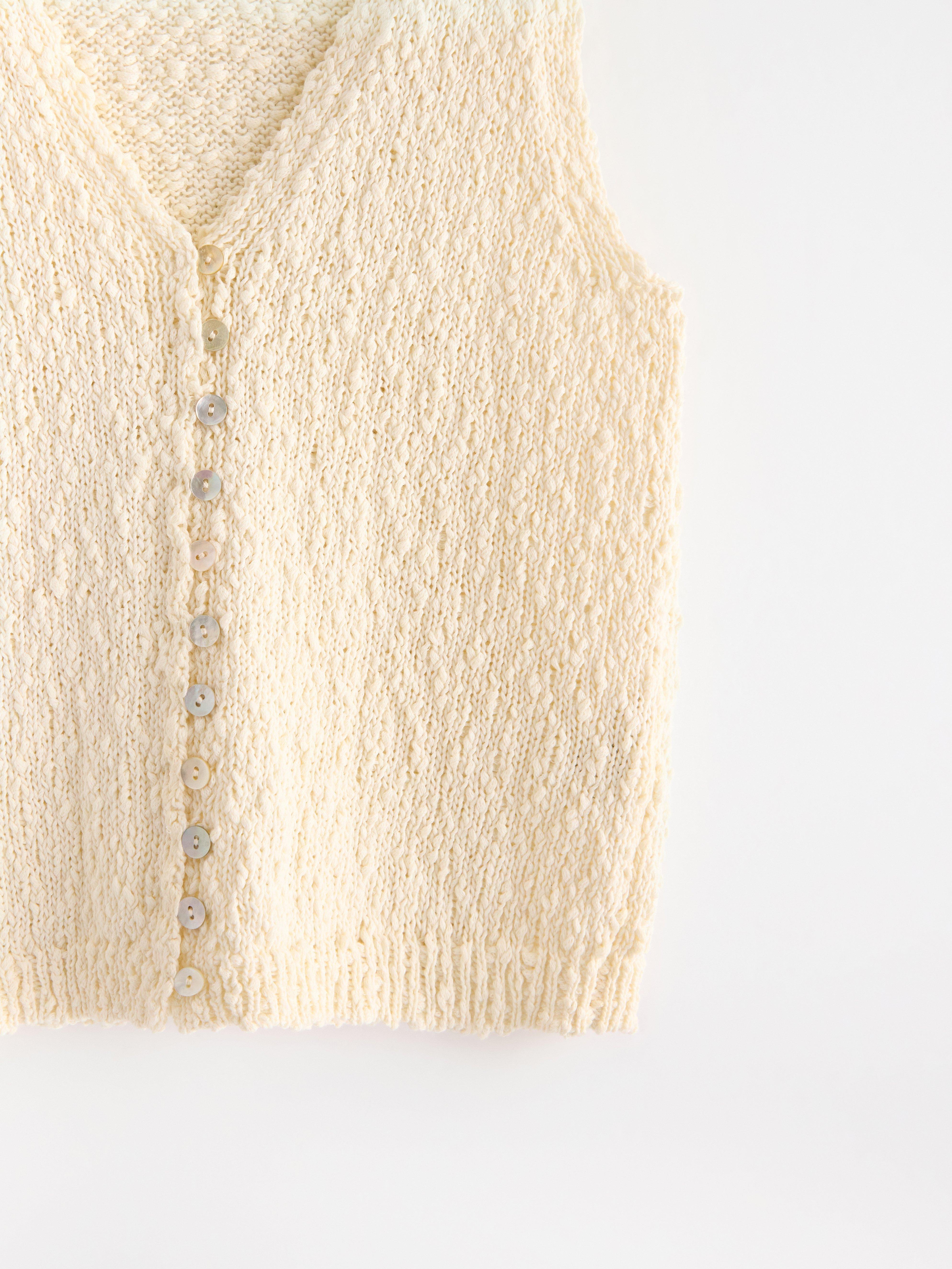 Colete de malha branco-creme