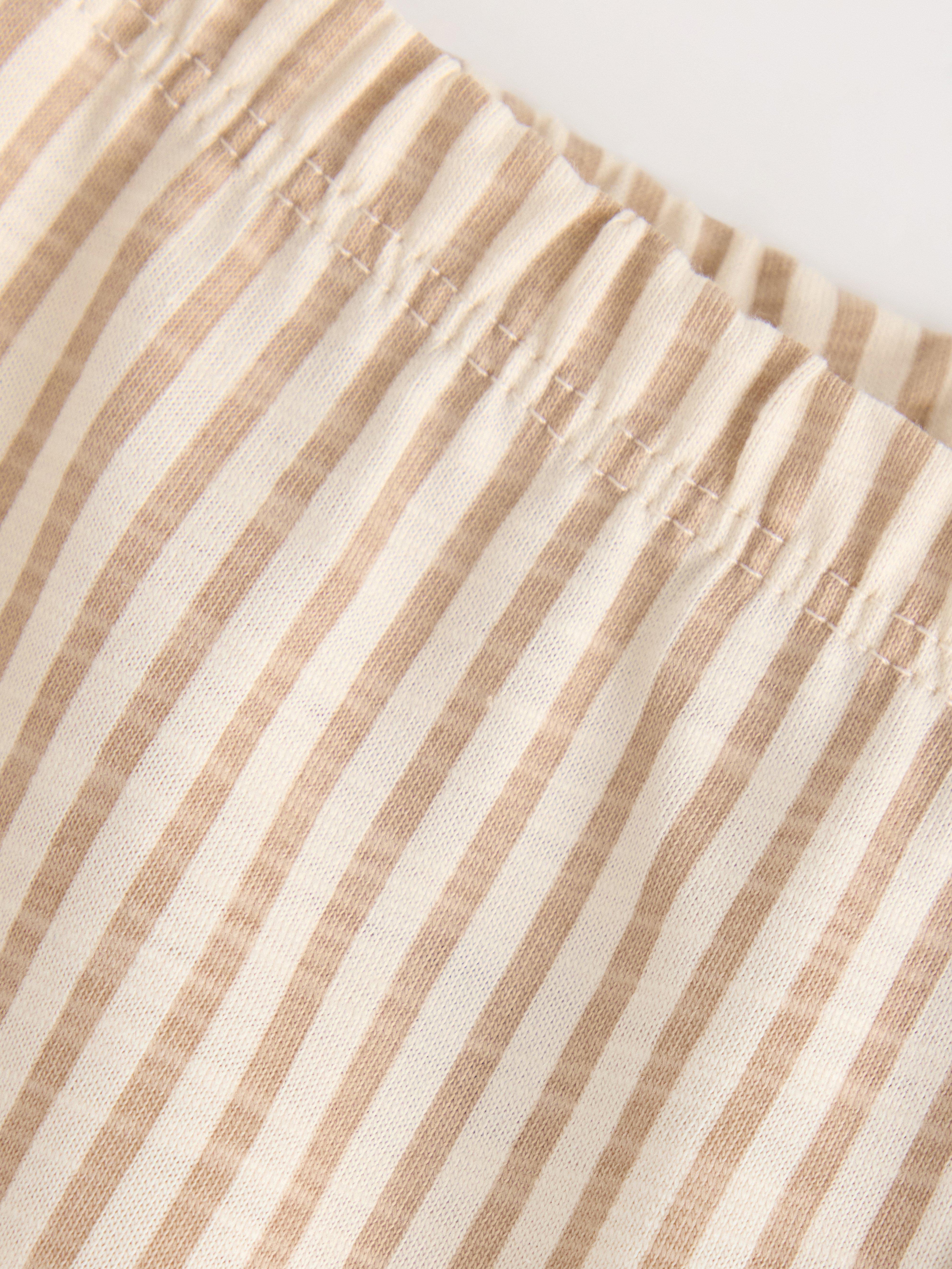 Pantalones de punto color beige
