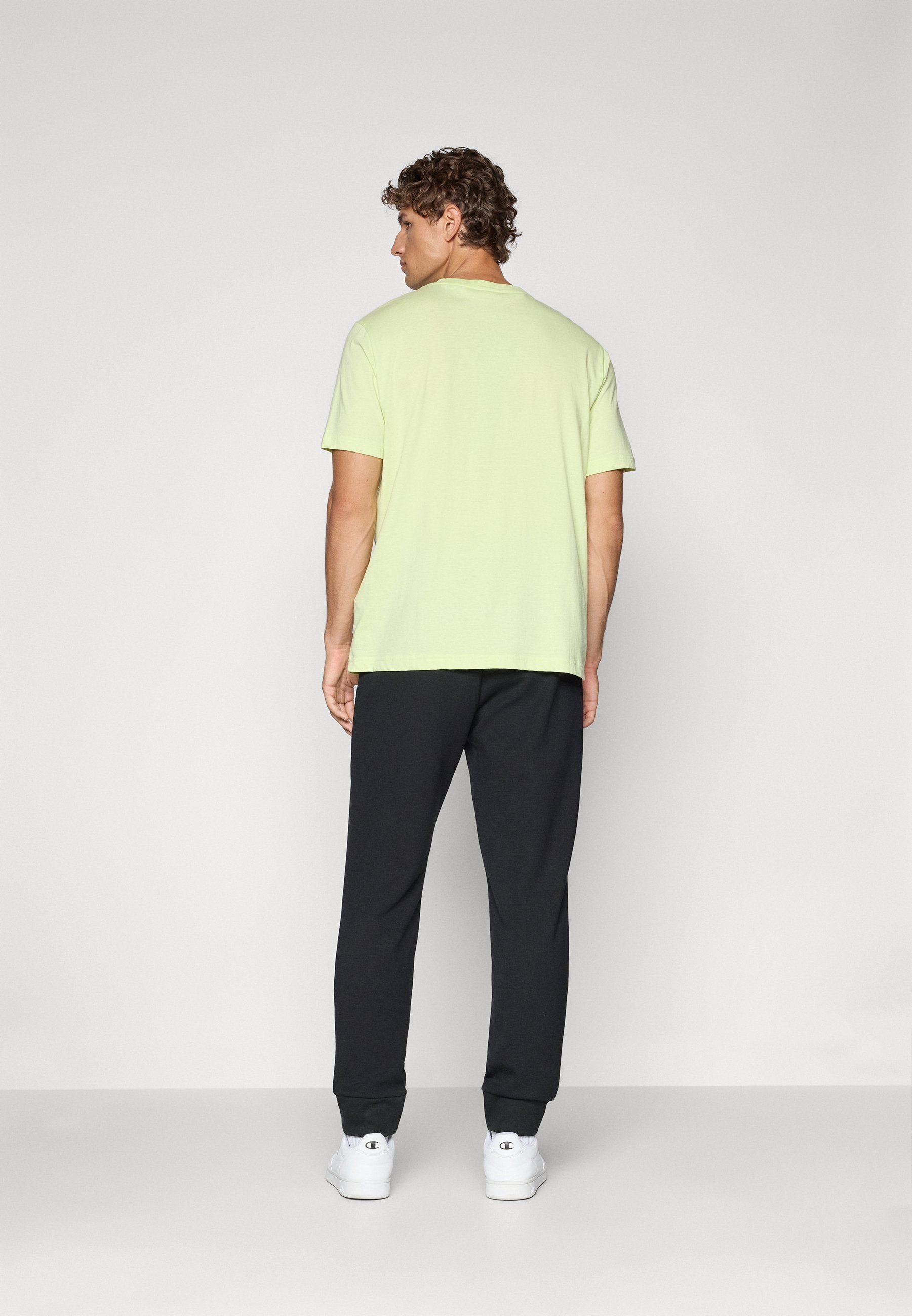 Pantaloni Champion C-TECH con risvolto - Pantaloni da tuta - neri