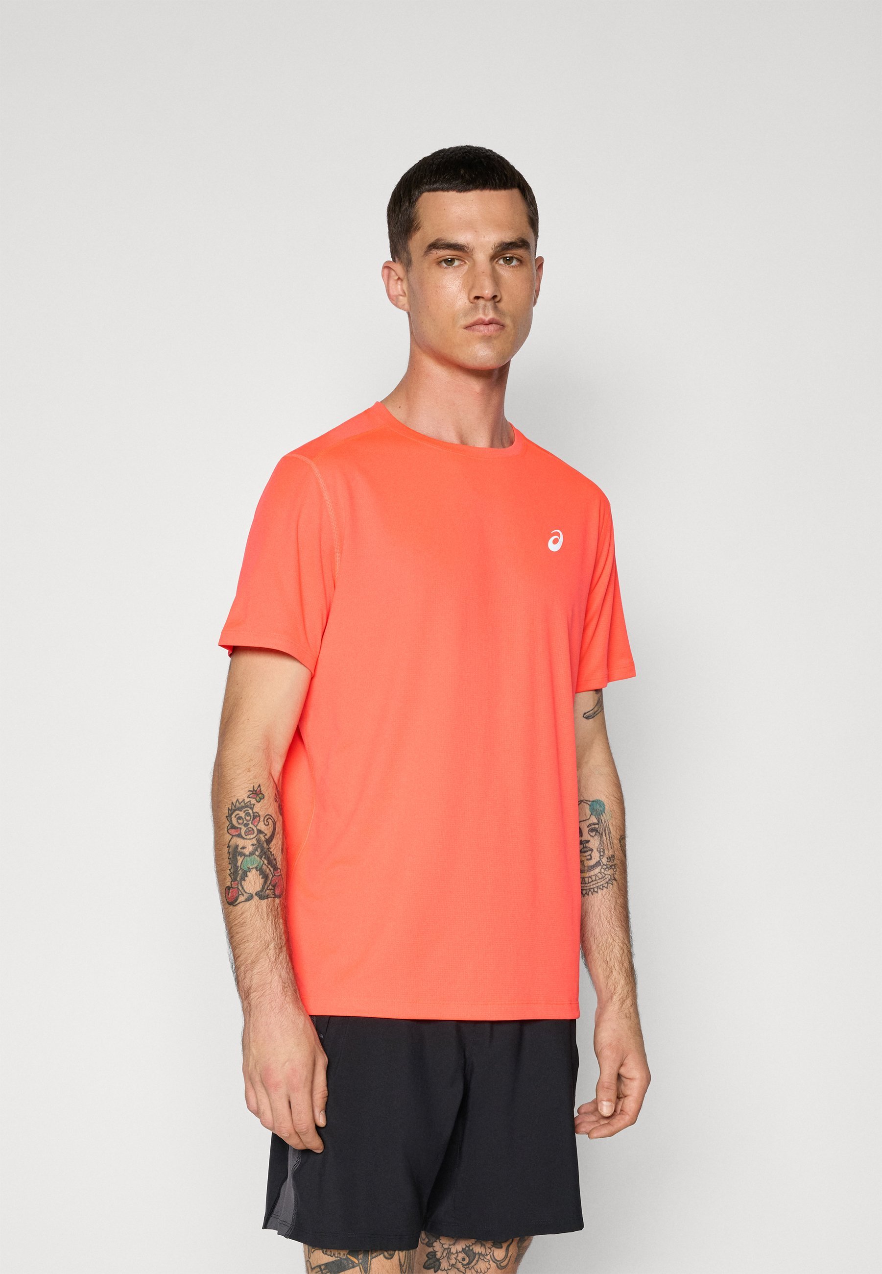 ASICS CORE TOP - T-shirt de sport - rouge vif