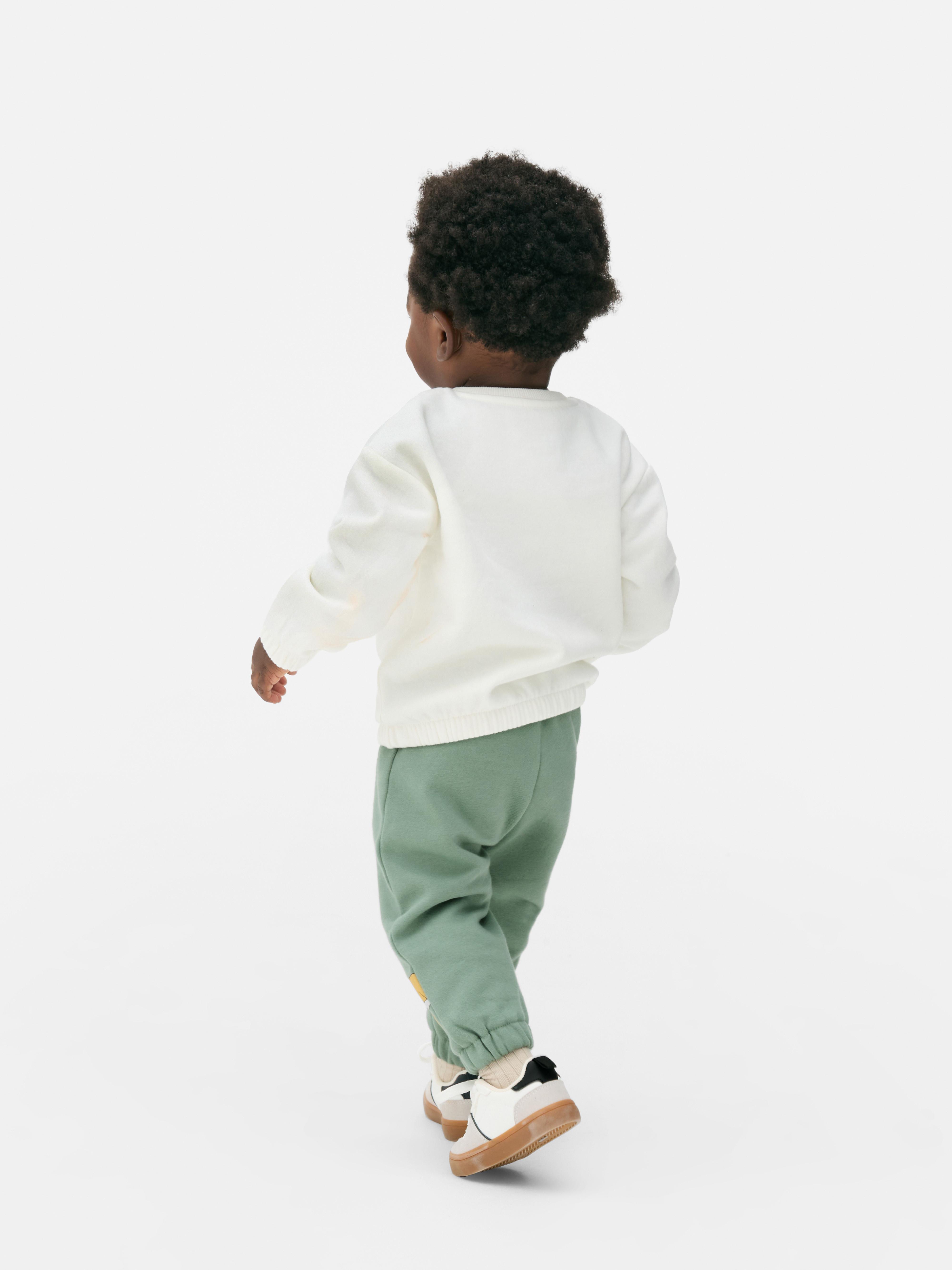 Pantaloni de trening Disney Regele Leu Simba cu talie elastică și înfățișează-l pe Simba