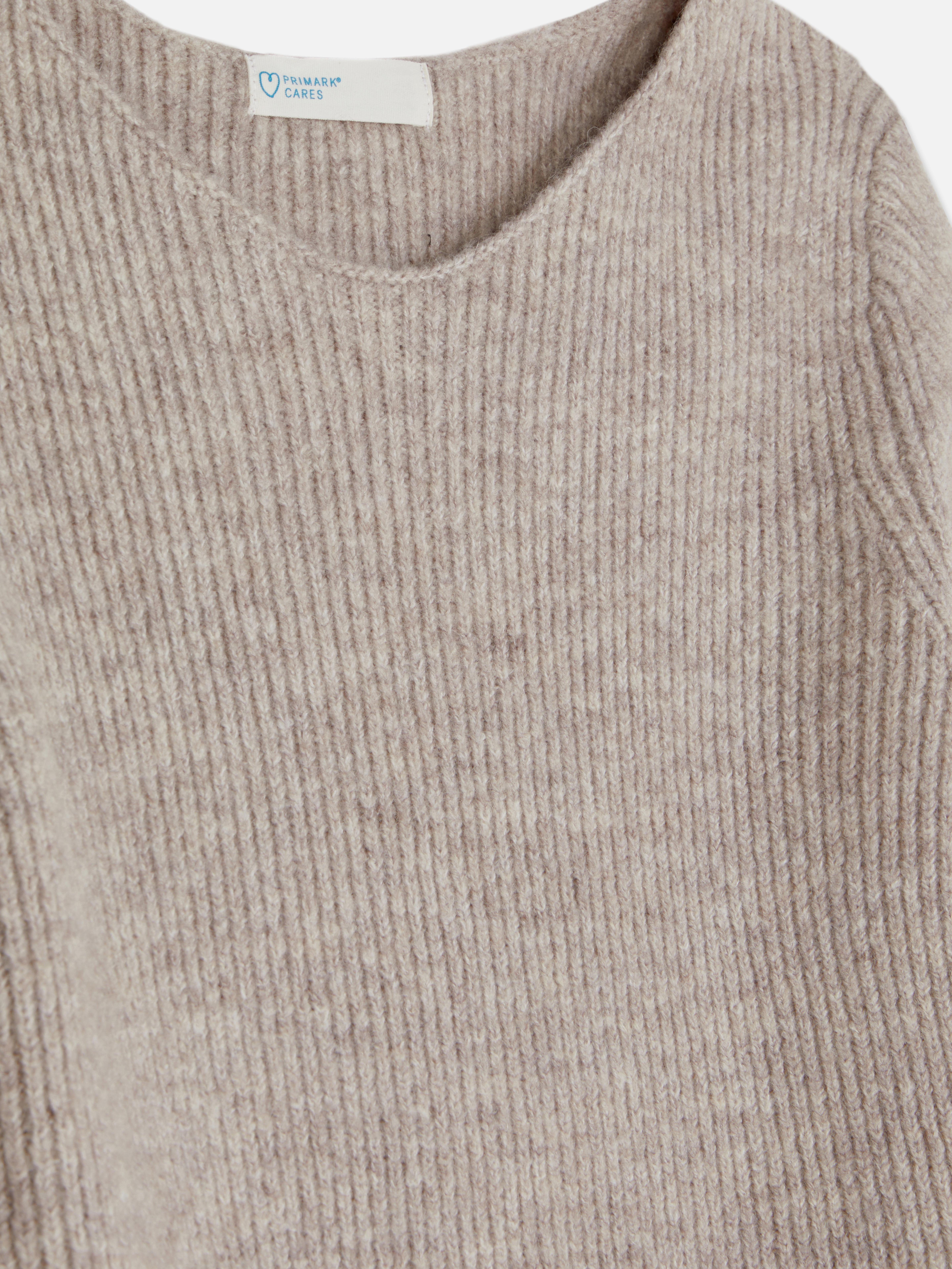 Mini salopette con scollo a barca Una salopette corta con scollo a barca