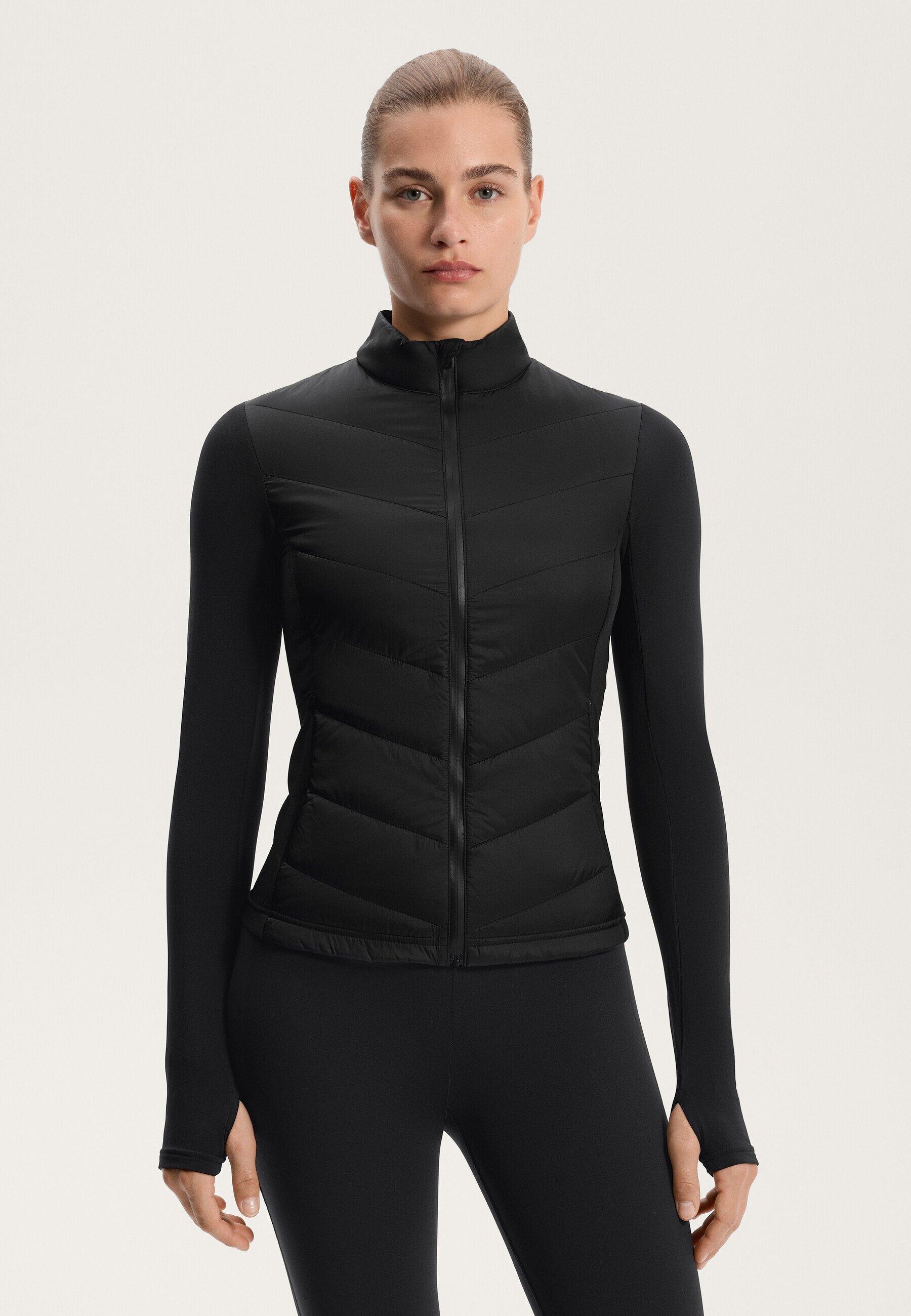 OYSHO VOLCANIC - Veste de running - noire