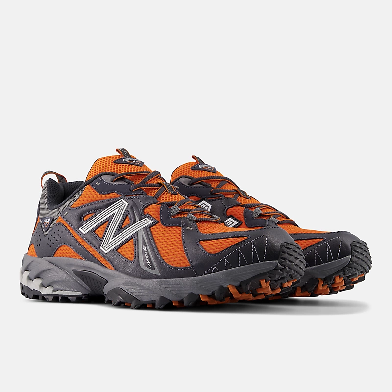 Unisex boty New Balance 610v1 - Varsity Orange s motivem Phantom a Castlerock