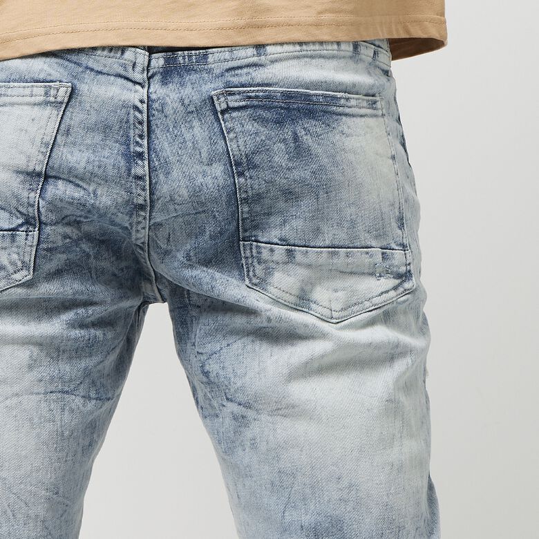Gebleekt, gewassen, gescheurde en gerepareerde jeans