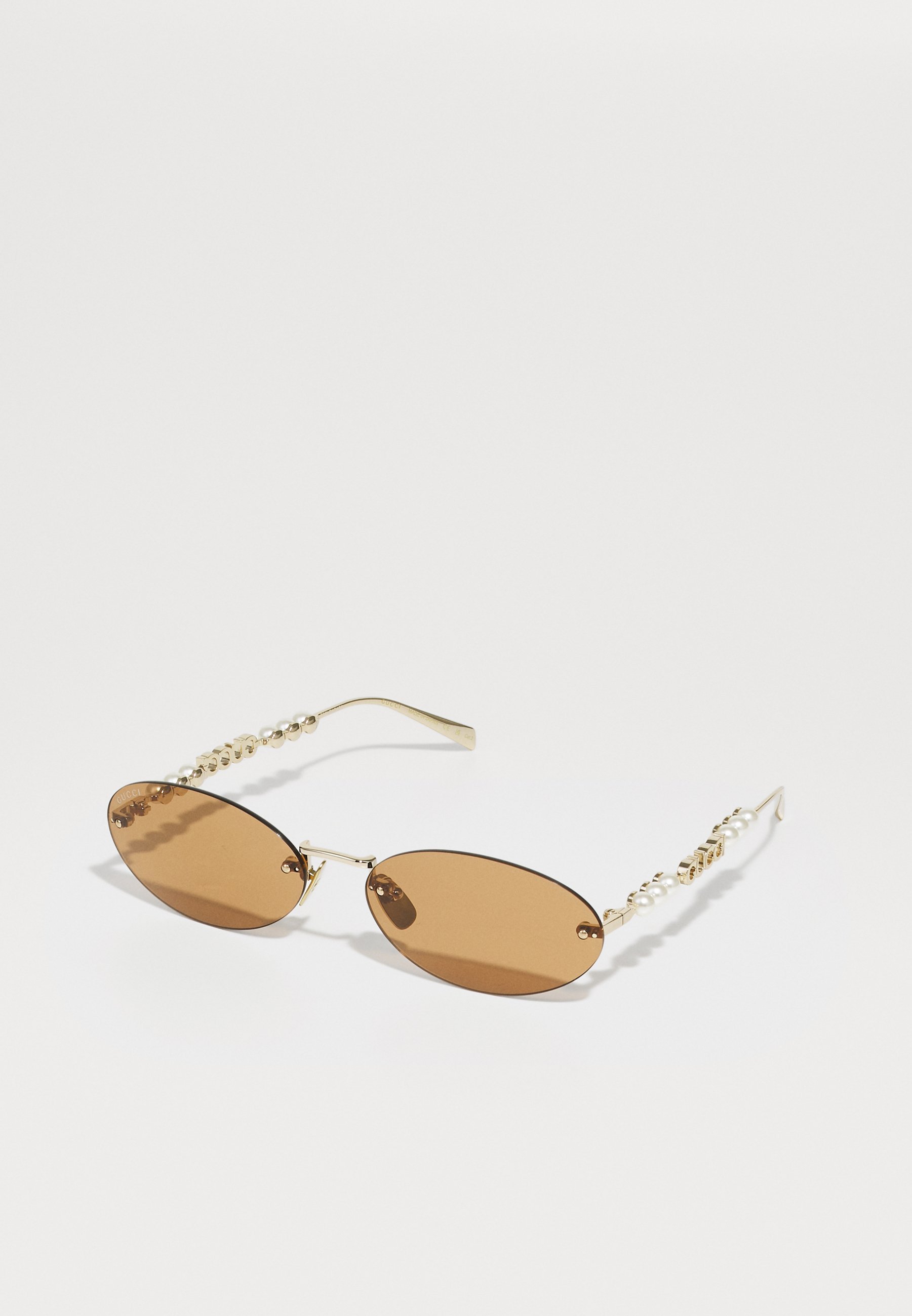 Gucci zonnebril - goudkleurig/bruin
