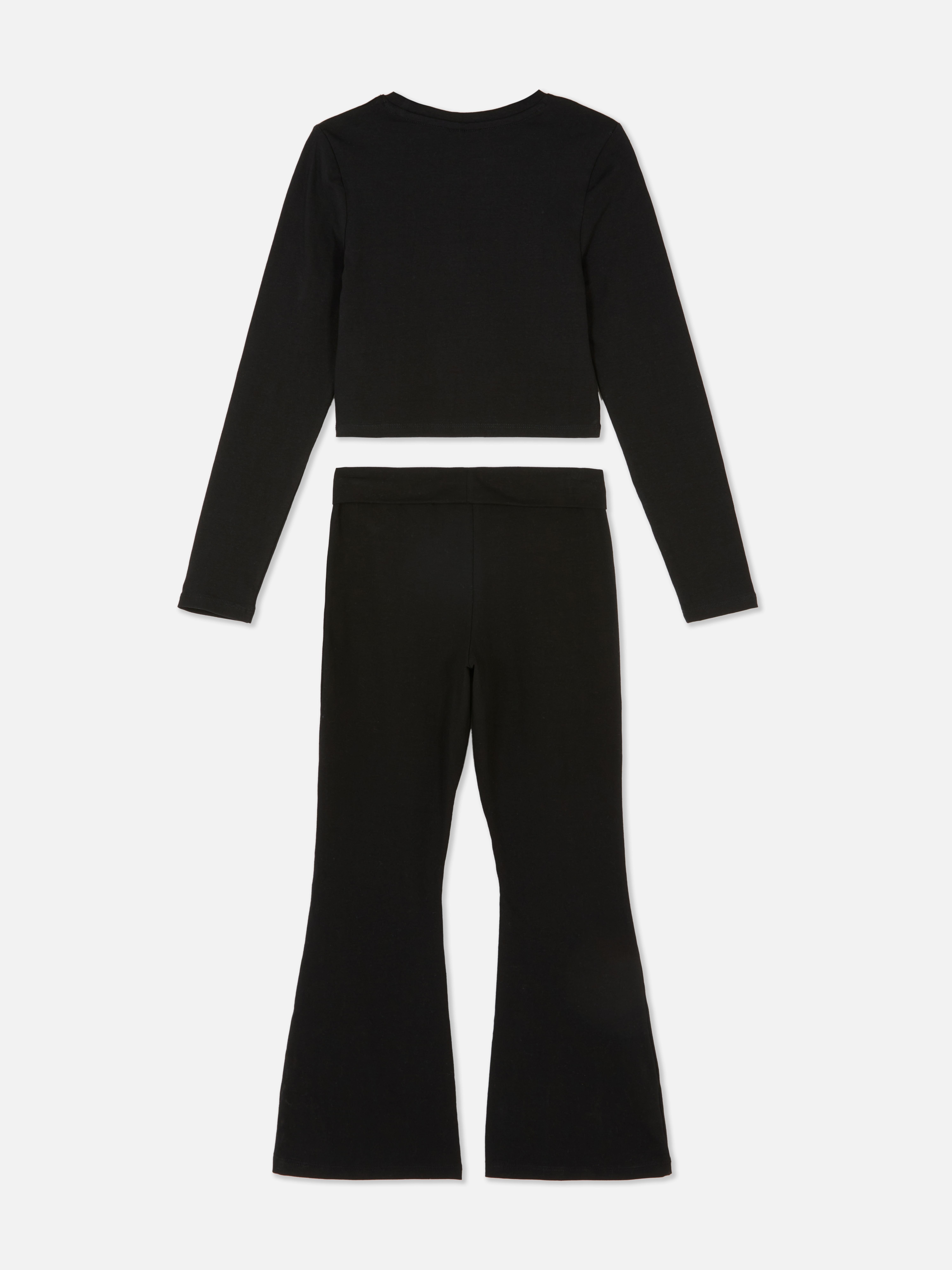 Top cu mânecă lungă Barbie și colanți evazați. Un top cu mânecă lungă asortat și colanți evazați cu imprimeu Barbie.