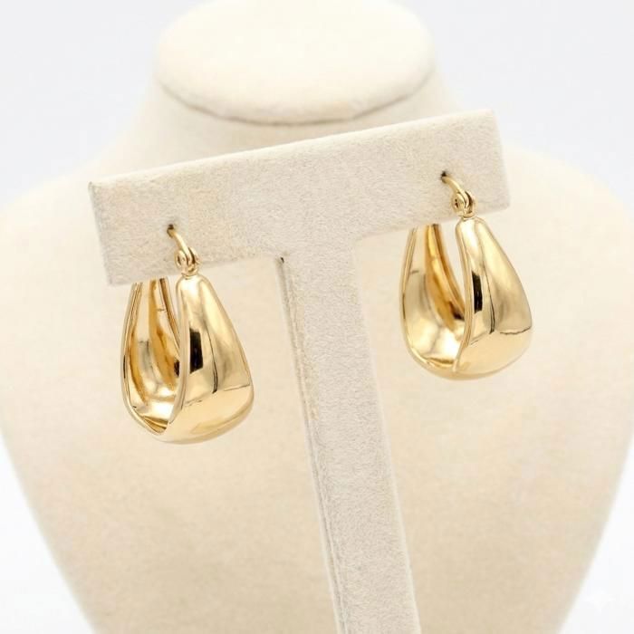 Brincos femininos de argola, ovais e largos, banhados a ouro amarelo 18k, com 3 mícrons de espessura, 25 x 15 mm.