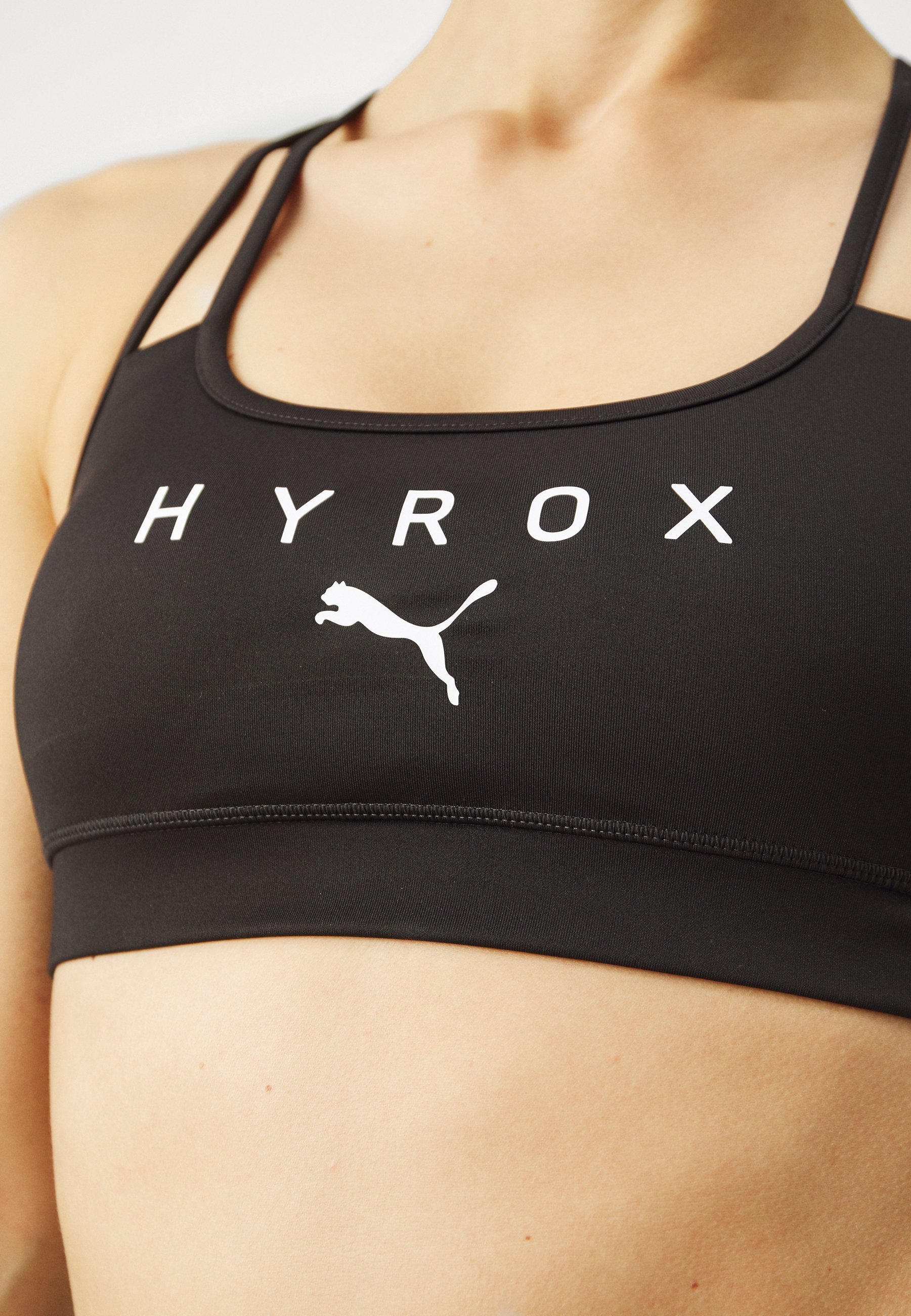 Puma HYROX MOVE STRAPPY BRA - Keskivahva tukiliivit - black