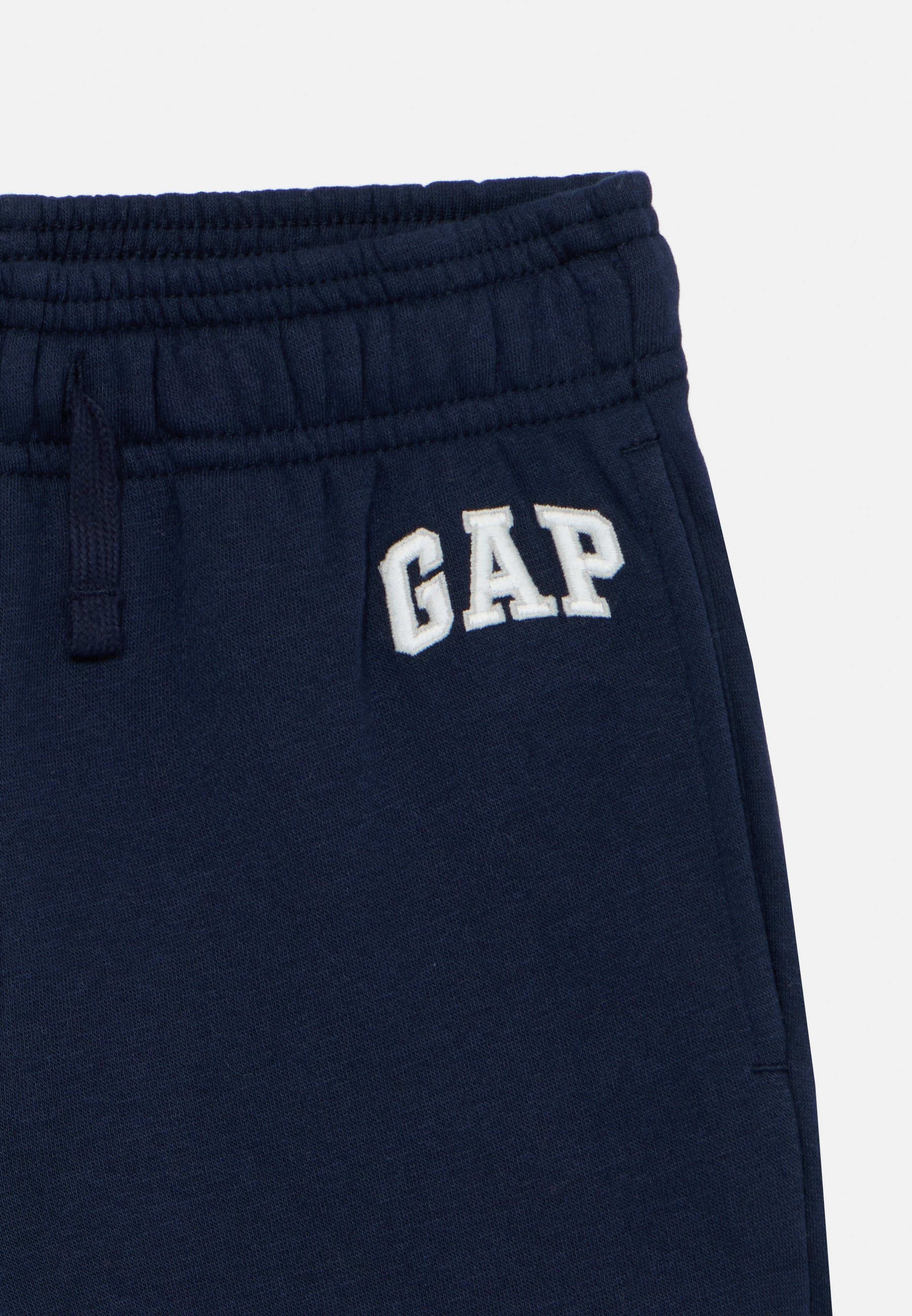 Spodnie dresowe GAP KIDS RELAXED GAP LOGO JOGGERS - Spodnie dresowe - granatowe