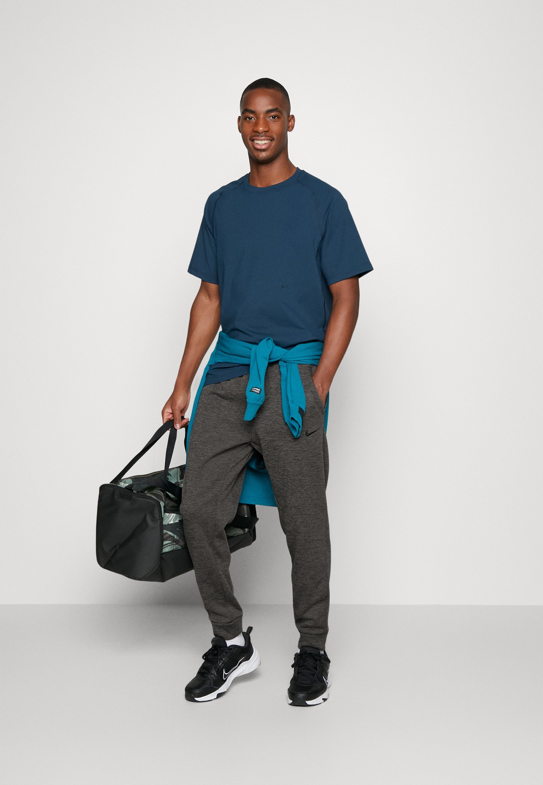 Pantaloni da tuta Nike Performance TAPER - grigio antracite/grigio fumo scuro/nero