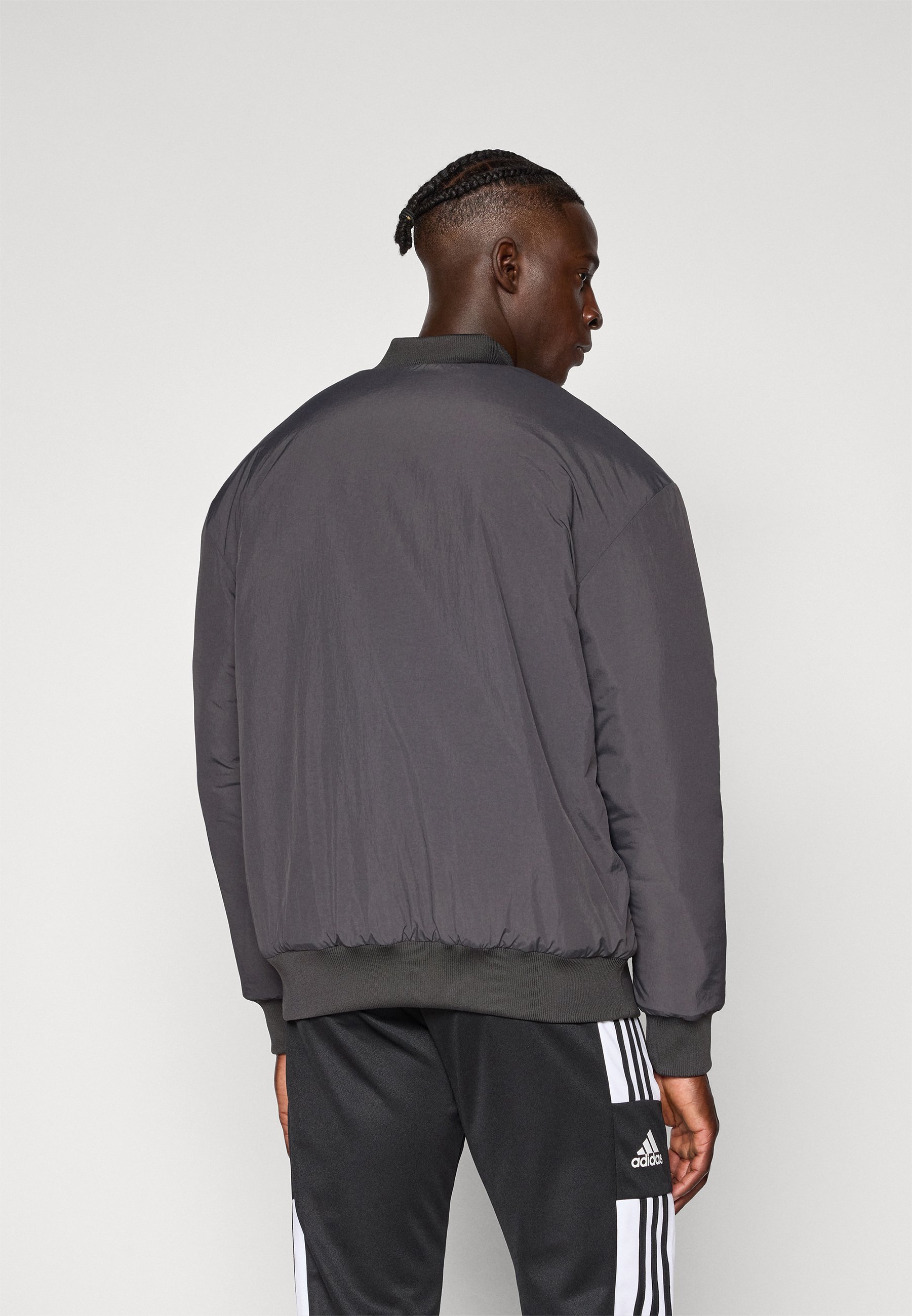 Giacca adidas Originals MANCHESTER UNITED ICON - Giacca invernale - nero utility/semi night flash