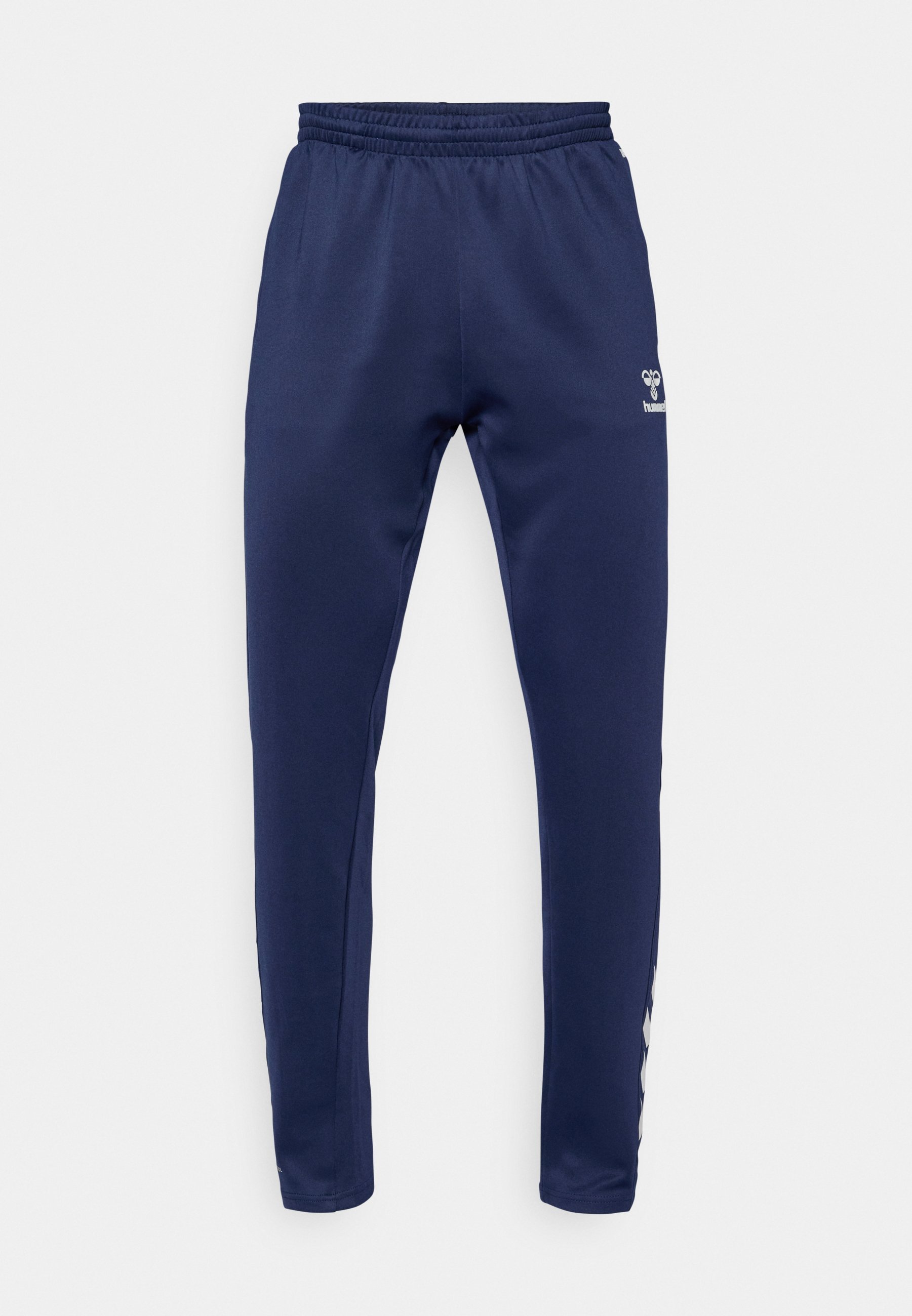 Hummel HMLCORE PANTS - Teplákové kalhoty - marine