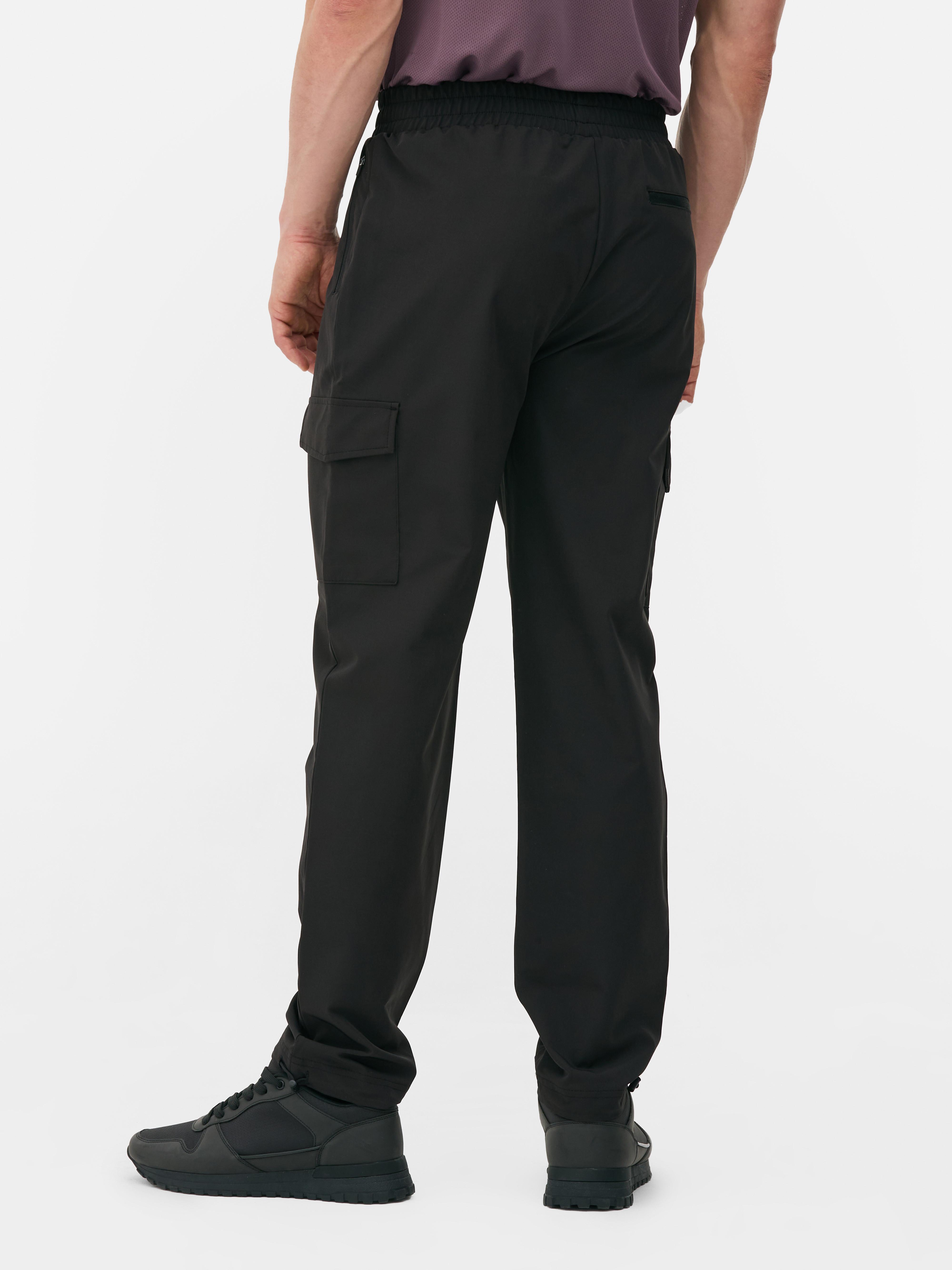Woven cargo sweatpants Woven sweatpants with stretchy waist, cargo pockets and adjustable ankle cuffs