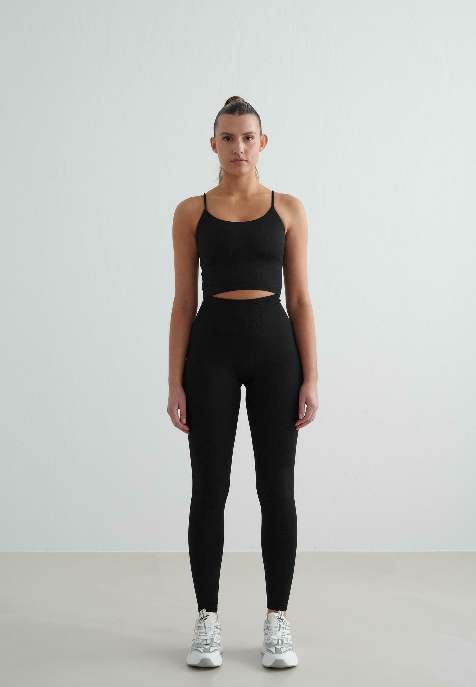 aim'n® SHAPE SEAMLESS SONELET - Reggiseno sportivo a supporto leggero - nero
