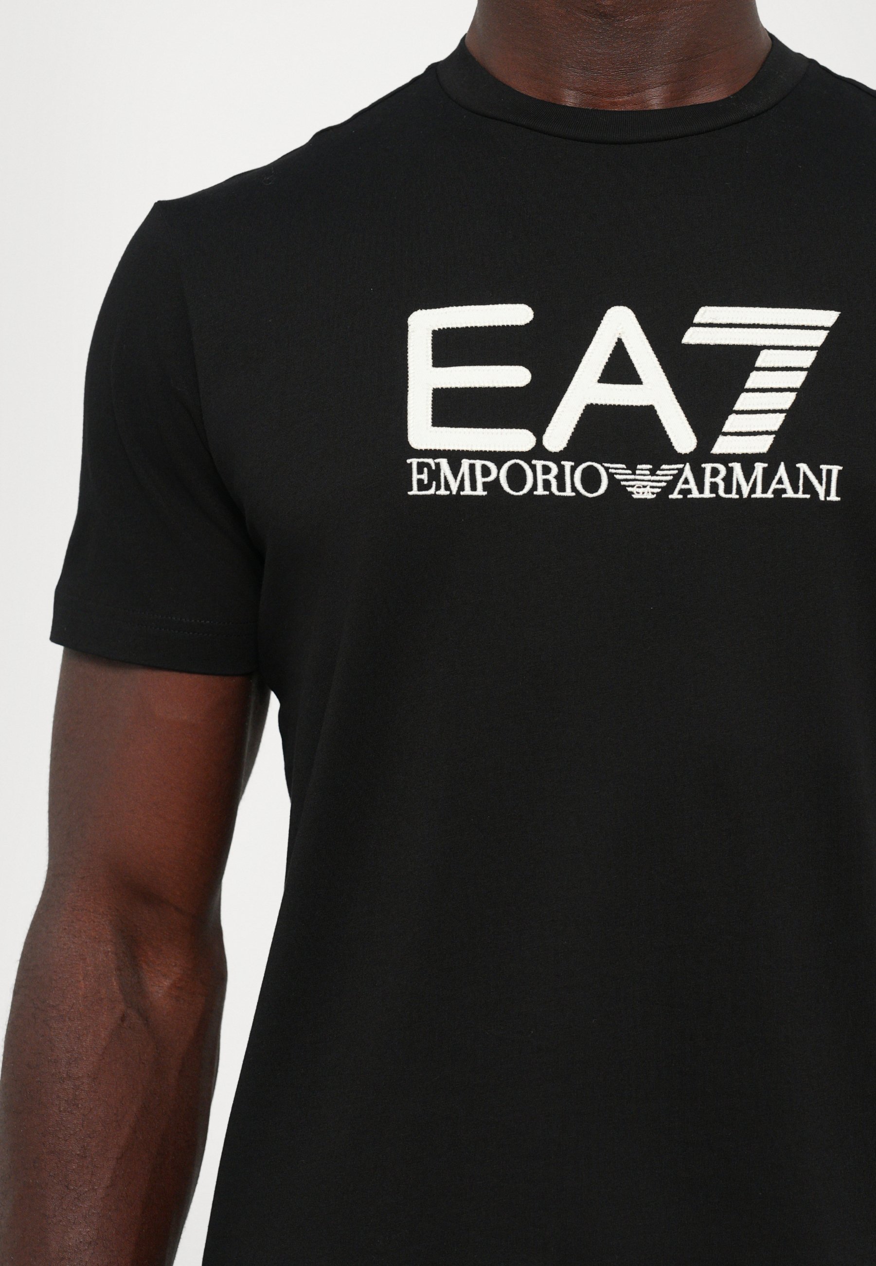 EA7 Emporio Armani TRAIN VISIBILITY TEE - T-shirt met print - zwart/crème