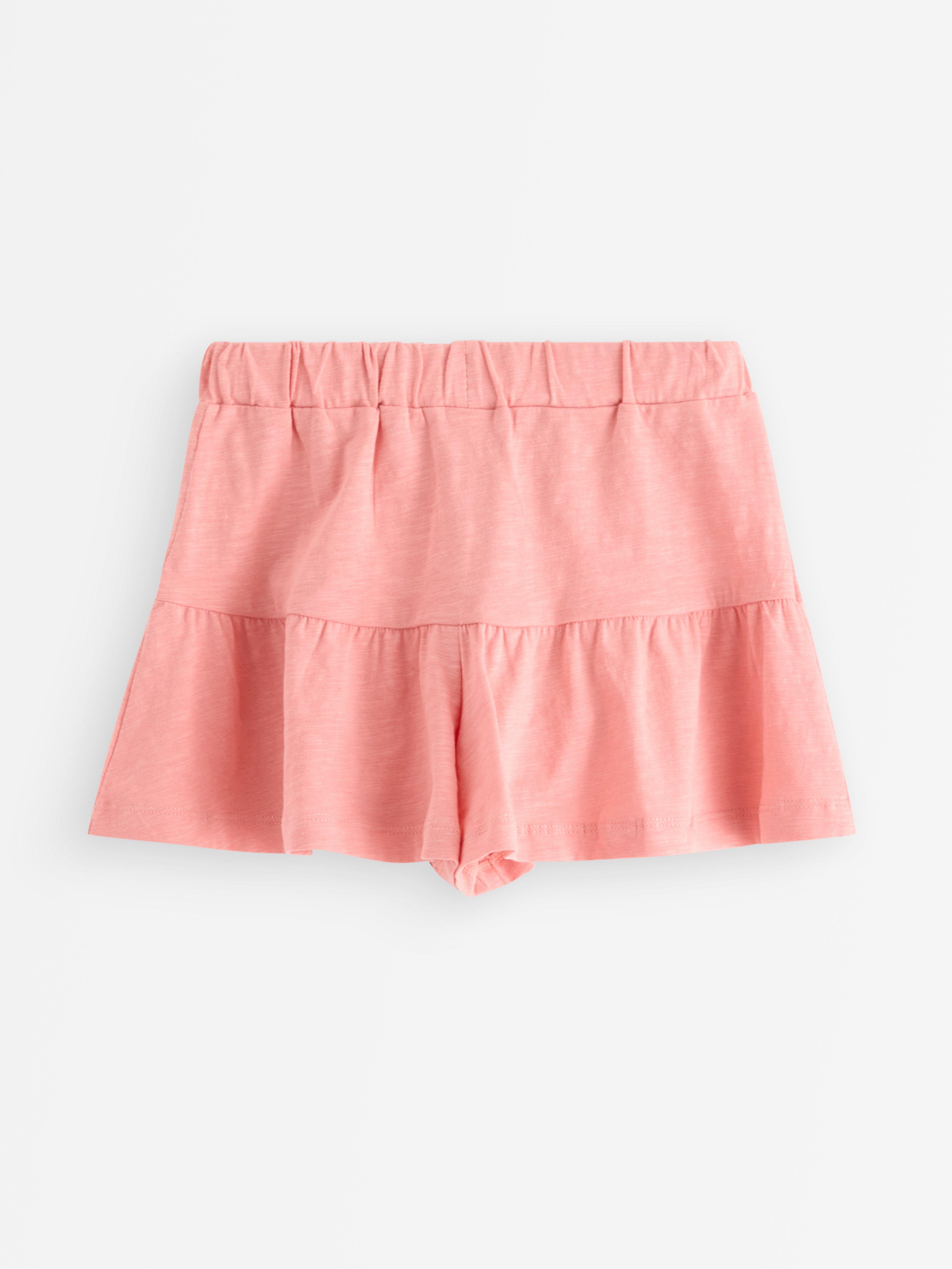 Falda culotte con volantes rosa