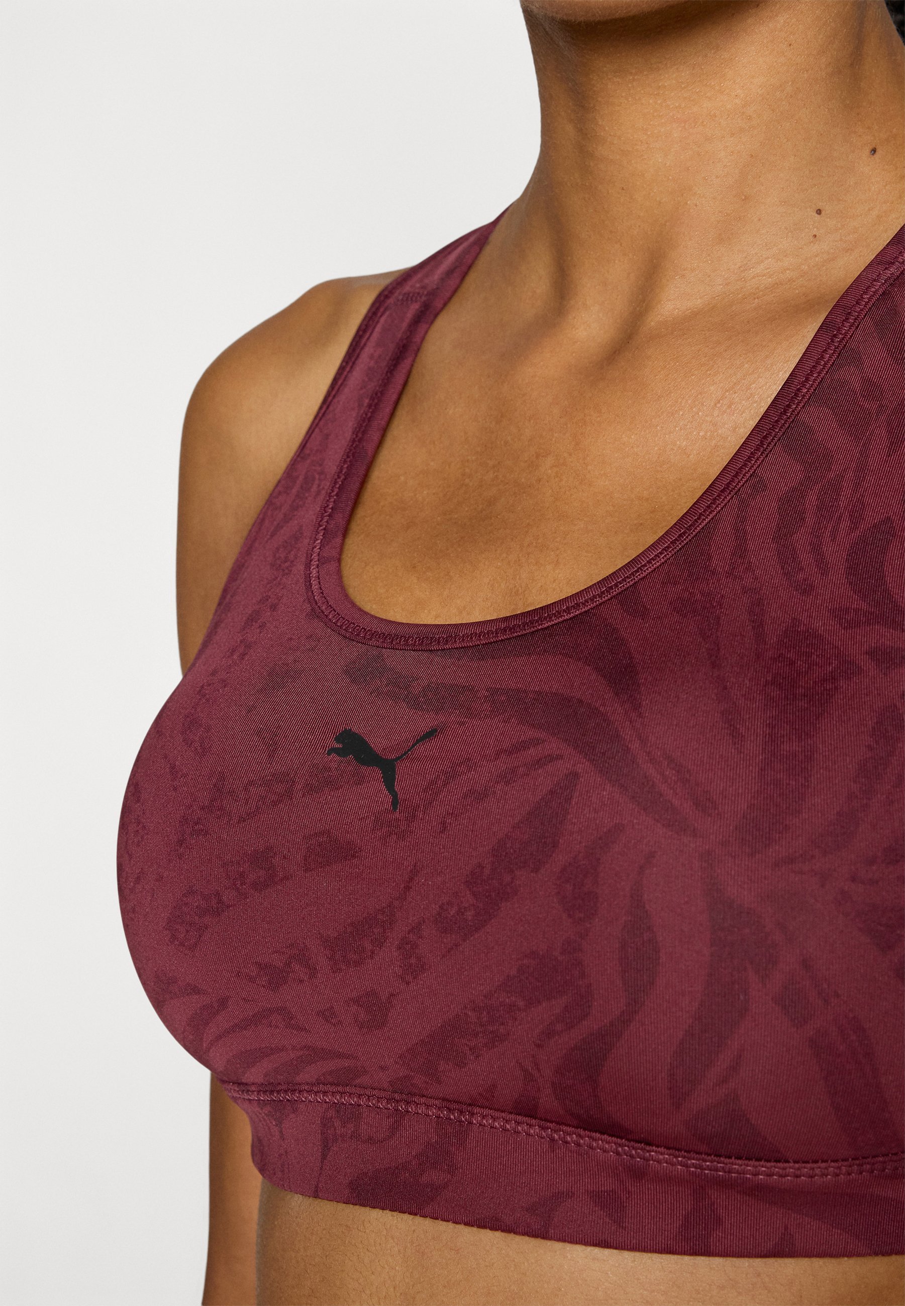 Soutien-gorge de sport Puma à rayures et rembourrage - Maintien moyen - effet rubis scintillant