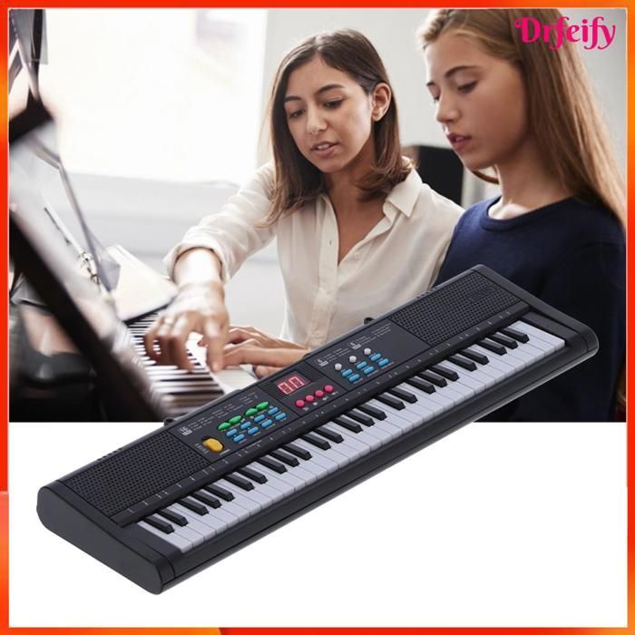 Teclado de piano de plástico, instrumento digital de 61 teclas con micrófono, canciones de demostración y volumen ajustable.