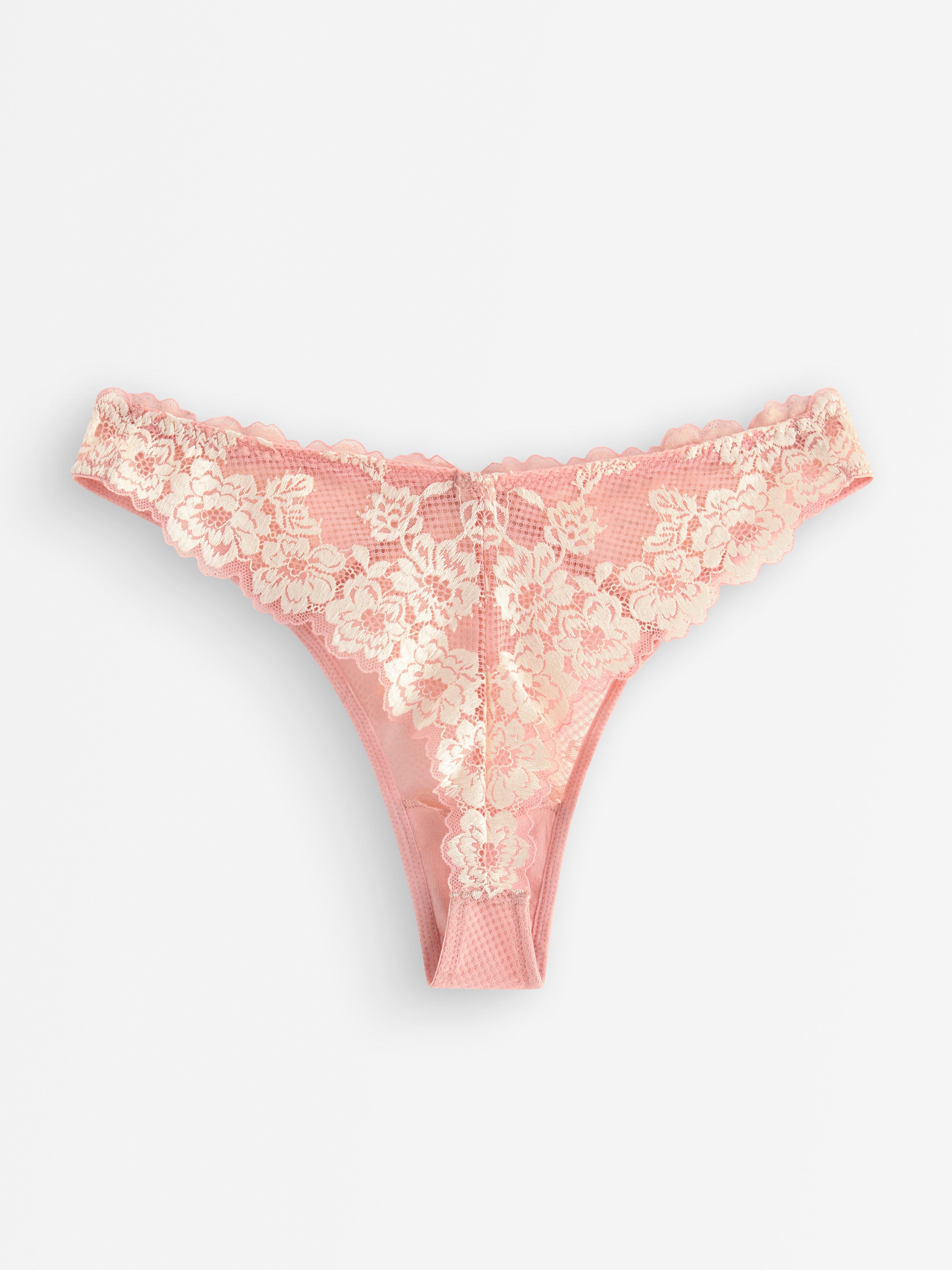 Calcinha fio dental de renda rosa claro