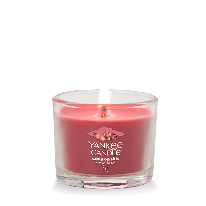 Filled Votive Candles Santa On Skis - Candela Profumata