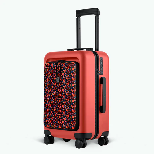 Cabaia LHR-Hartschalenkoffer mit 4 Rollen und orangefarbener MAD-Tasche
