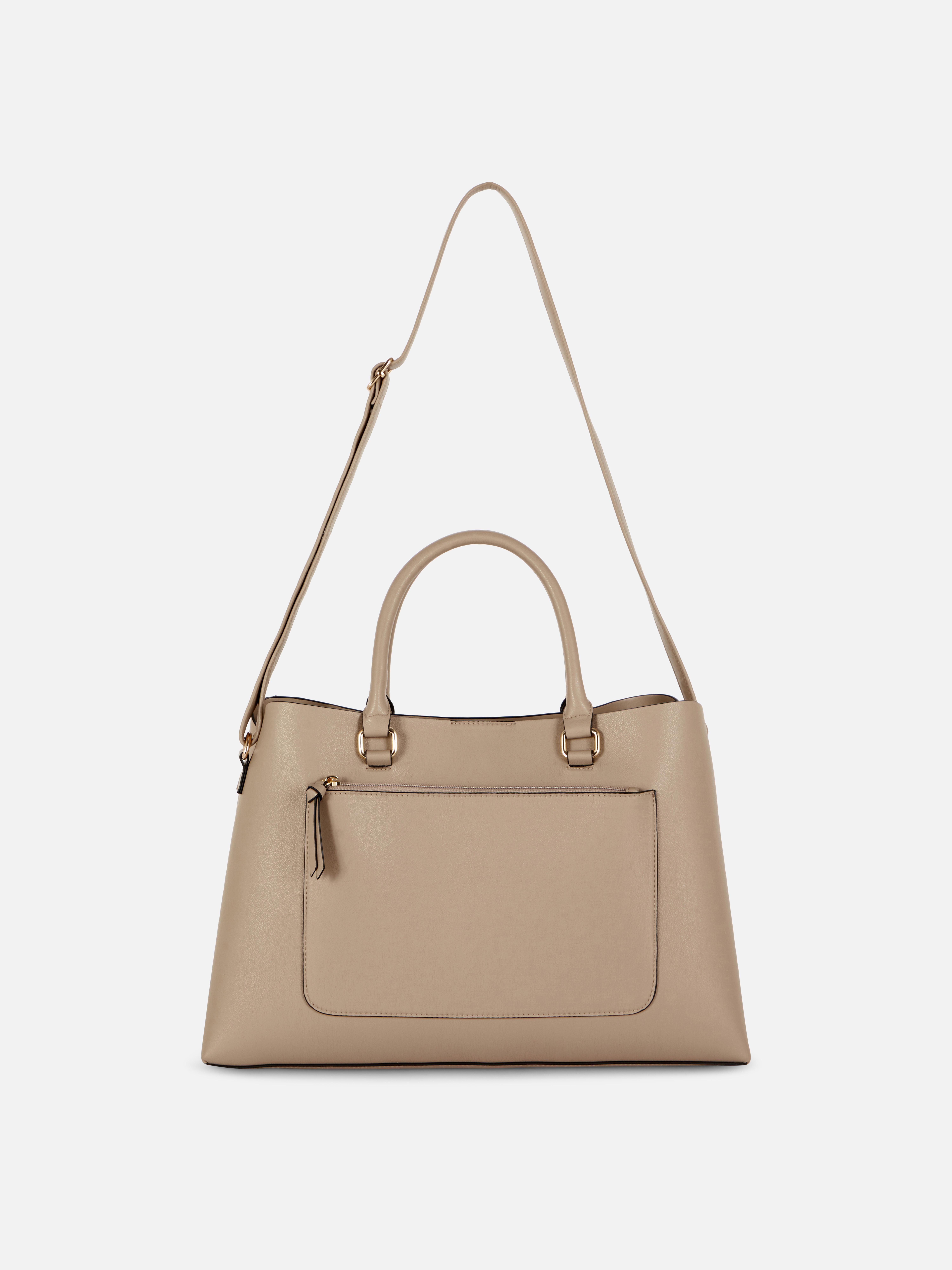 Geantă tote din piele ecologică cu buzunar cu fermoar. Geanta ta tote de zi cu zi este acum și mai elegantă, din piele ecologică cu buzunare.