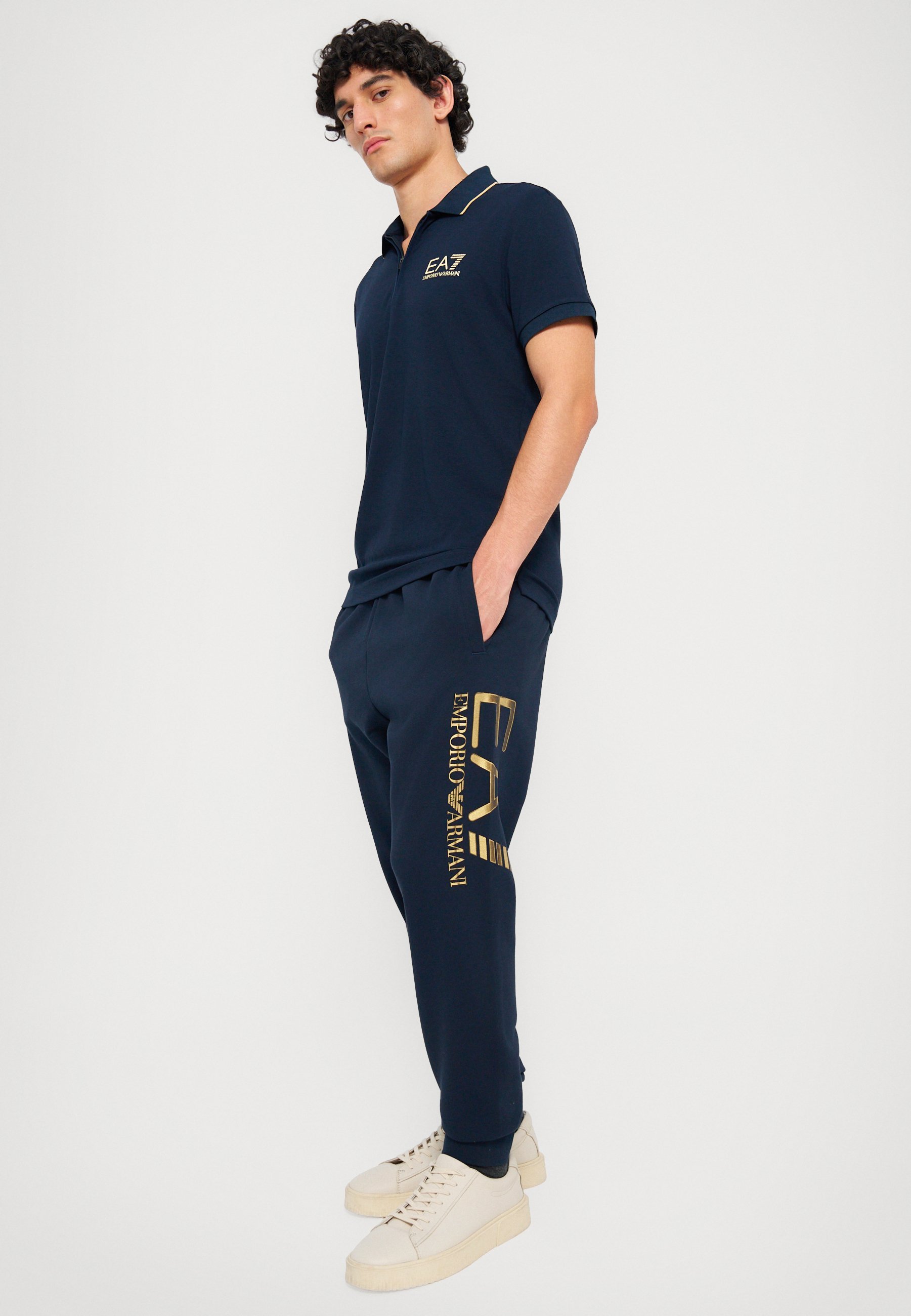 EA7 Emporio Armani TRAIN LOGOSERIES - Teplákové nohavice - modrá