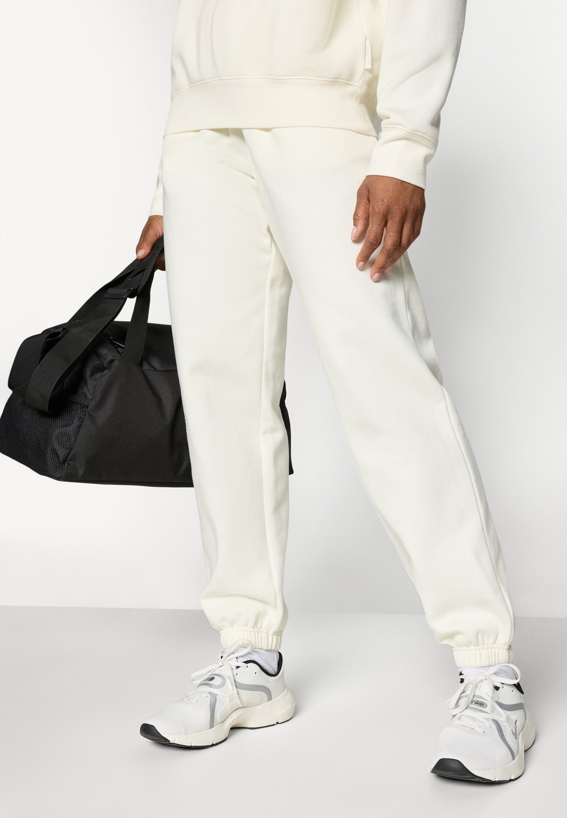 Pantaloni della tuta Björn Borg STUDIO - Tracksuit bottoms - cannoli cream