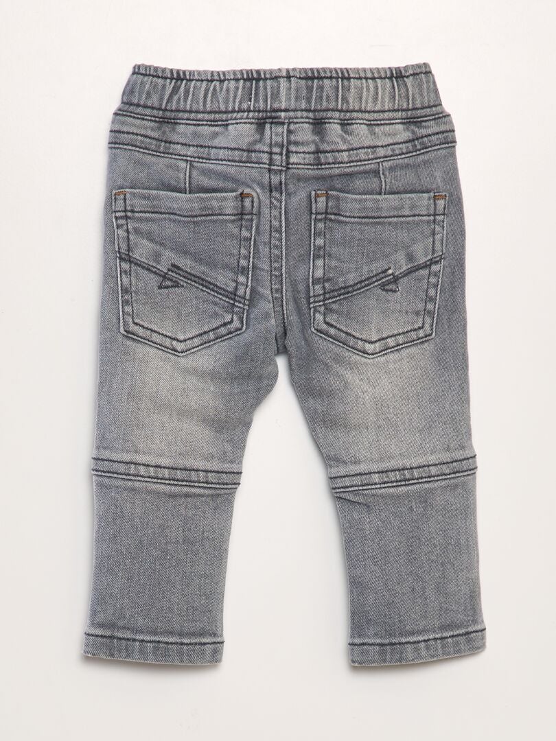 Jeans met uitsnijdingen - GRIJS
