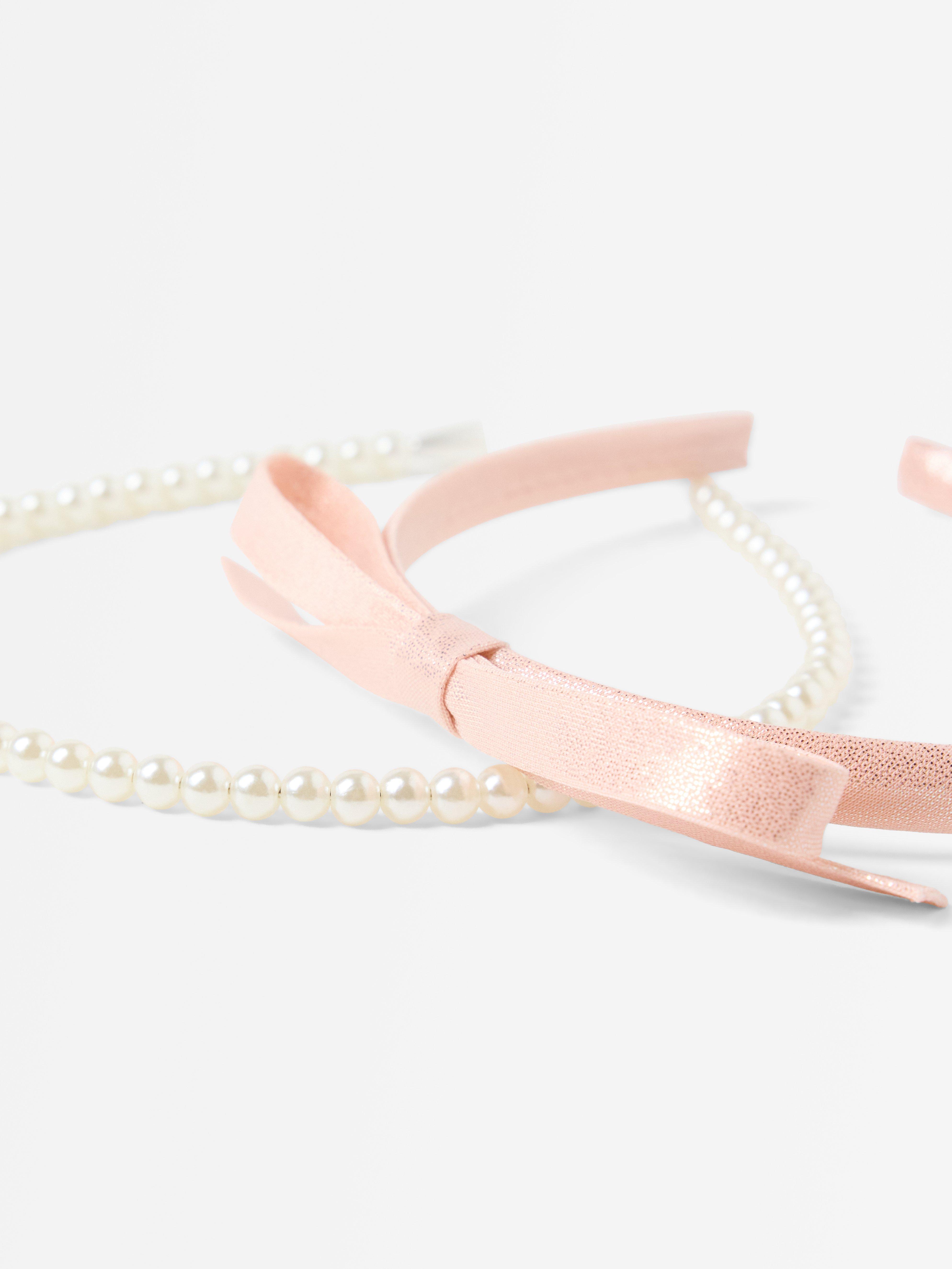 Conjunto com 2 tiaras brancas
