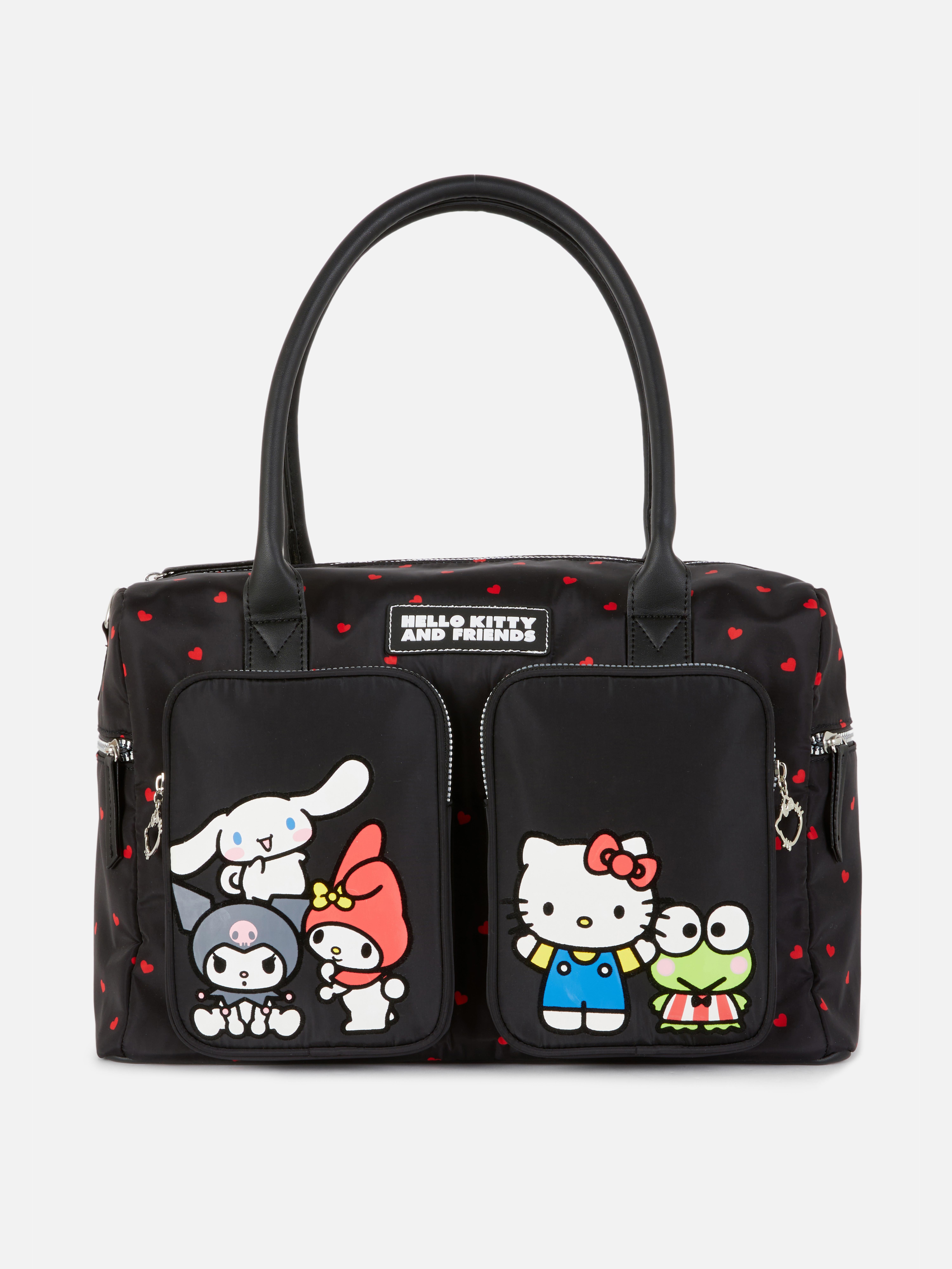 Hello Kitty und Freunde Wochenendtasche Diese verspielte und praktische Hello Kitty Wochenendtasche ist perfekt für dein nächstes Abenteuer