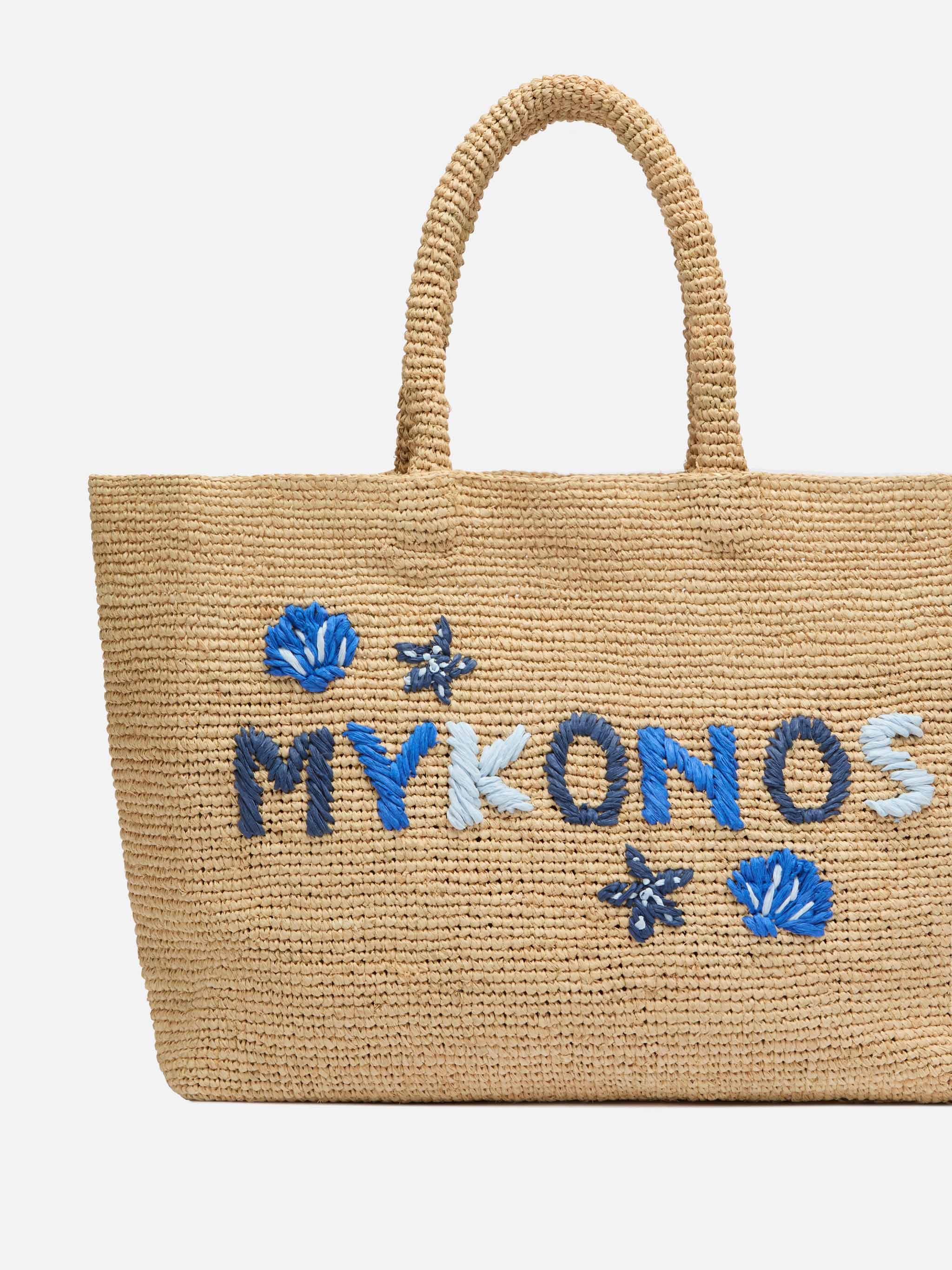 Beige raffia strandtas met katoenen binnenvak en Mykonos-borduurwerk.