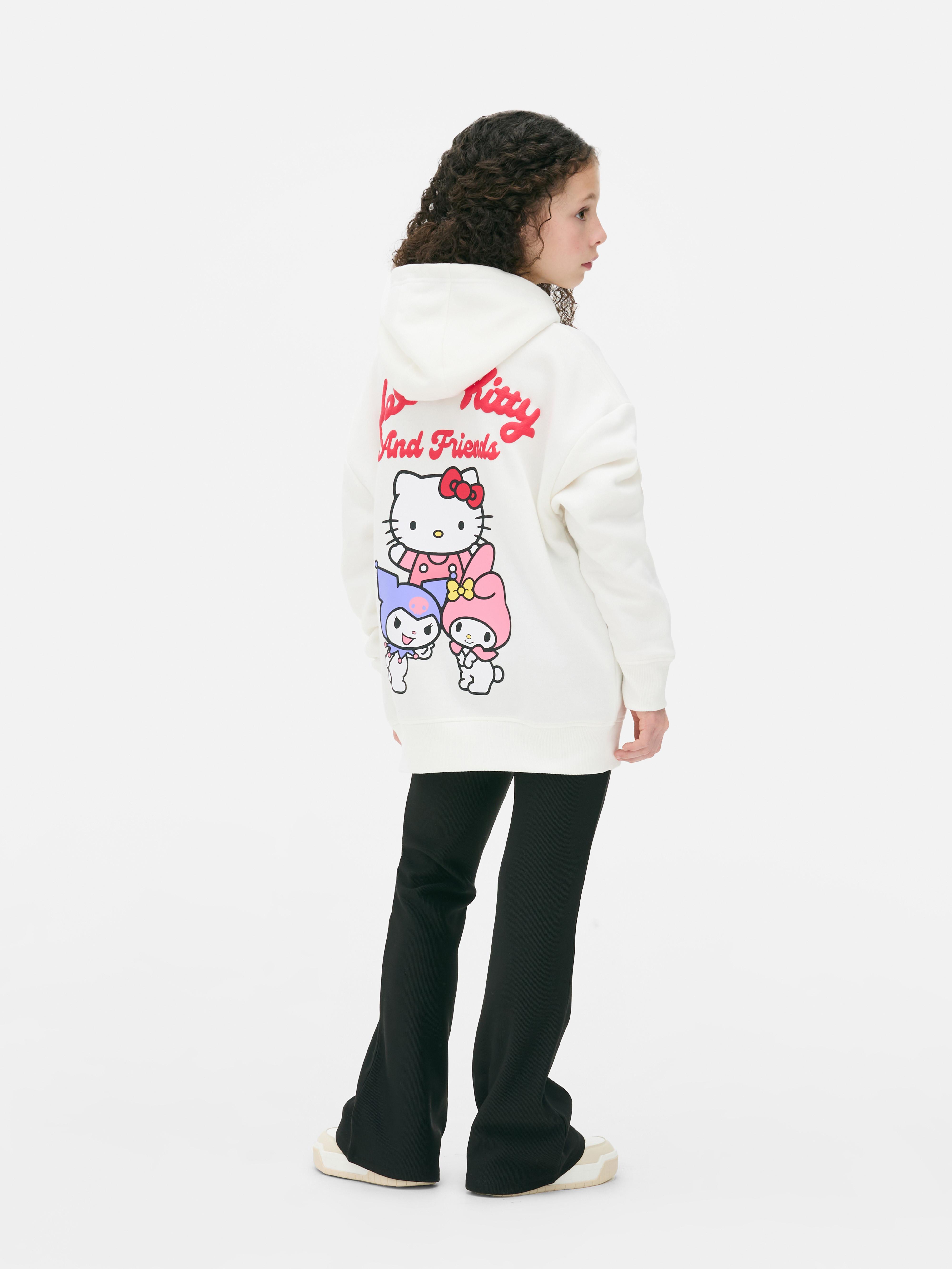Hanorac asortat cu imprimeu Hello Kitty and Friends. Un hanorac cu buzunar tip cangur, manșete cu nervuri și un design Sanrio.