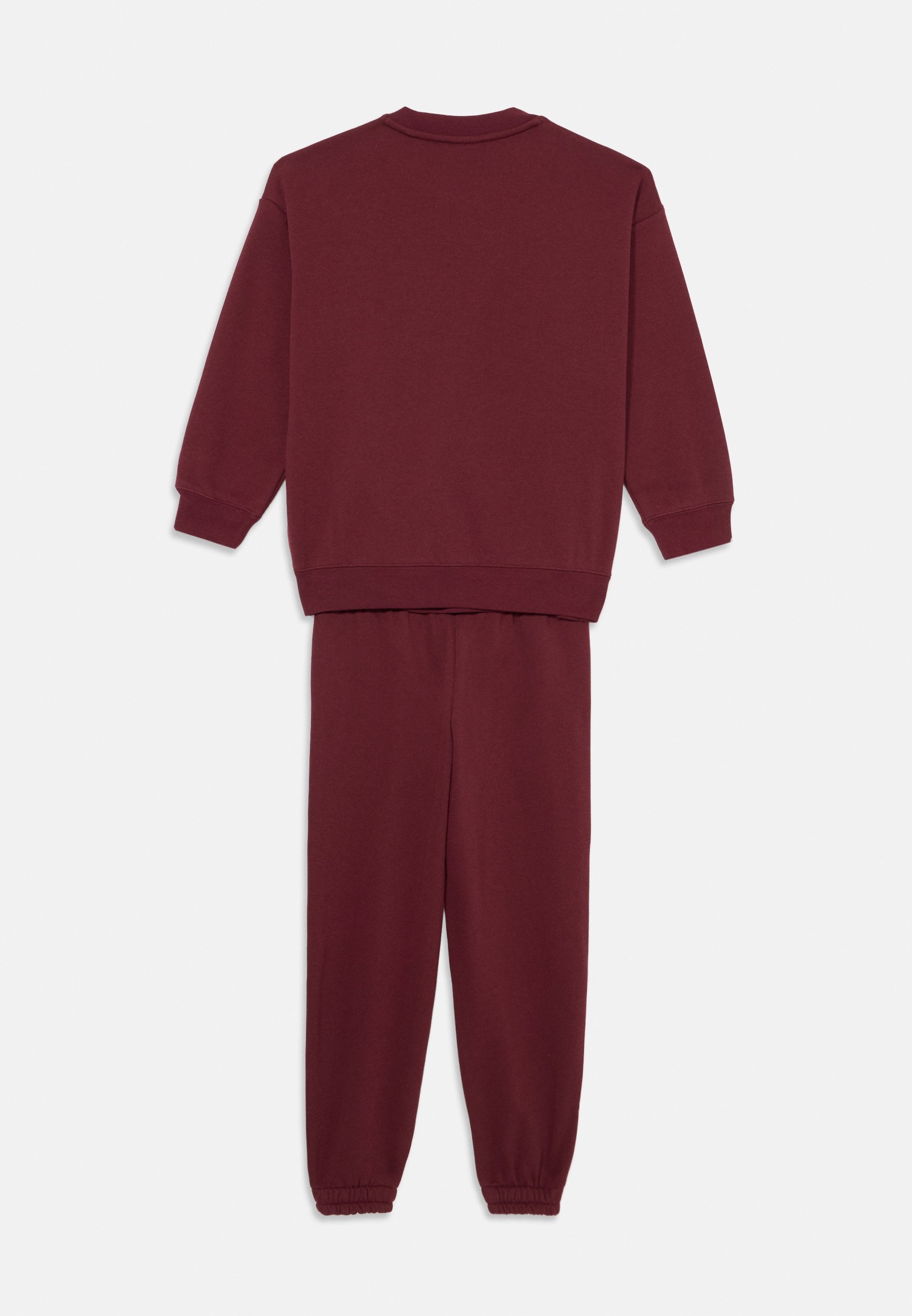 Puma UNISEX SET - Trainingspak - robijnrood glinsterend