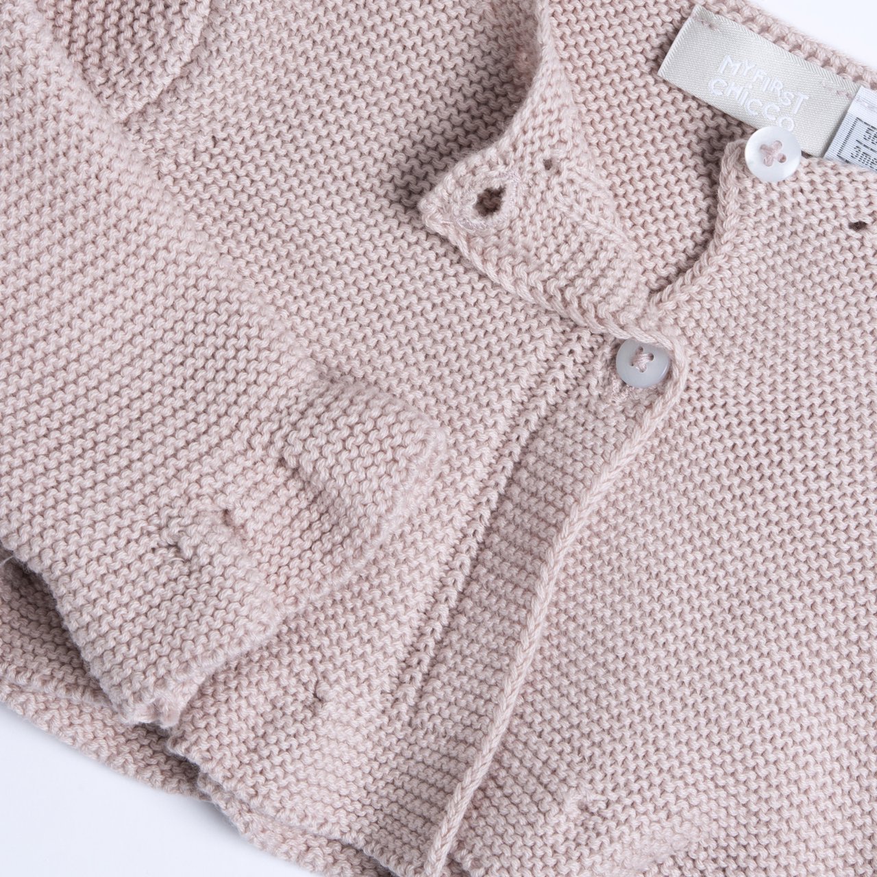 Rosa Baumwollstrickjacke mit Rüschen