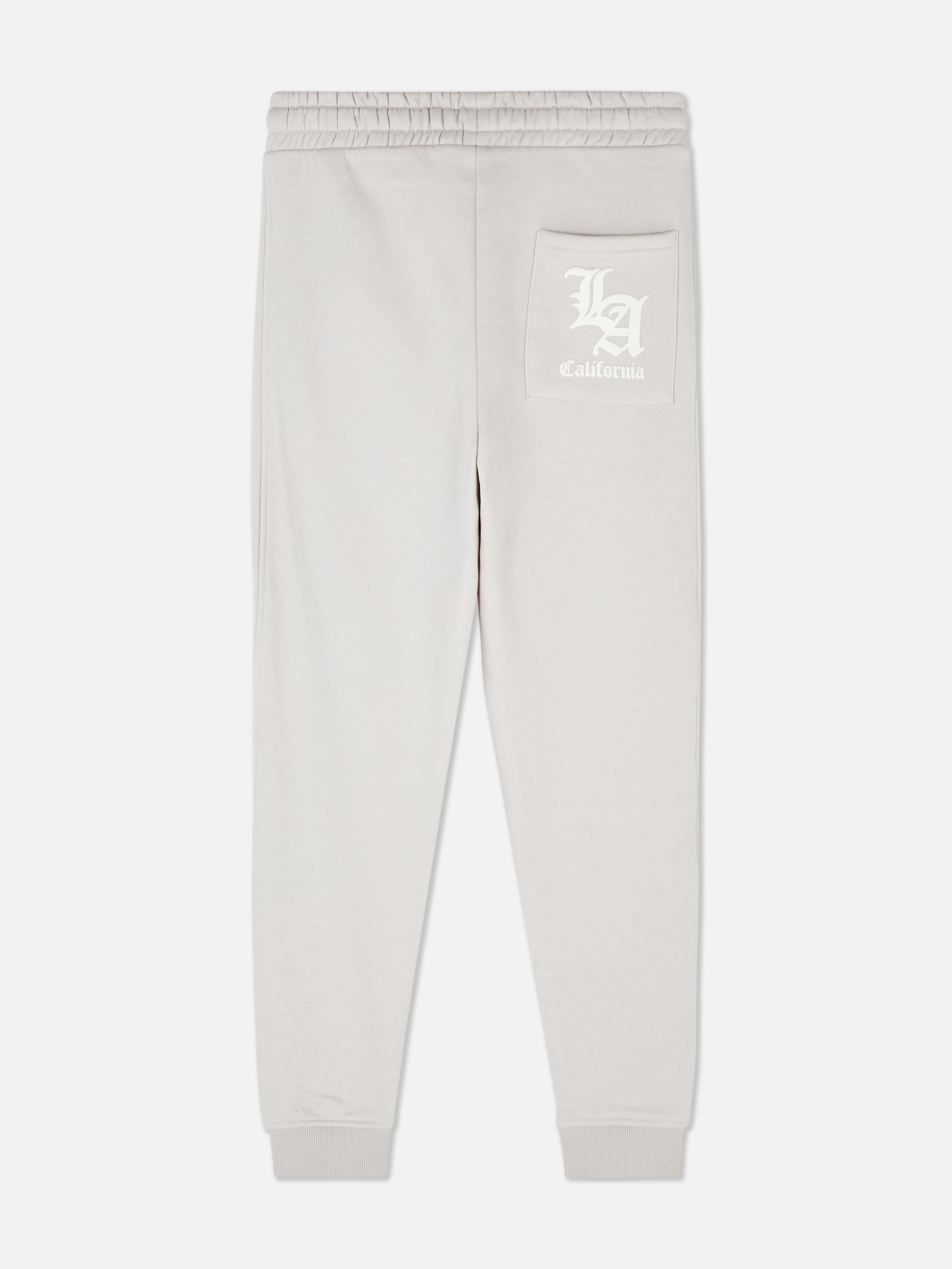 Pantaloni de jogging cu sloganul LA Pantaloni de jogging cu talie cu șnur, buzunare laterale și buzunar aplicat la spate