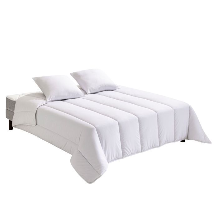 Edredón Bultex de peso medio de 260x240 cm y almohadas de 60x60 cm.