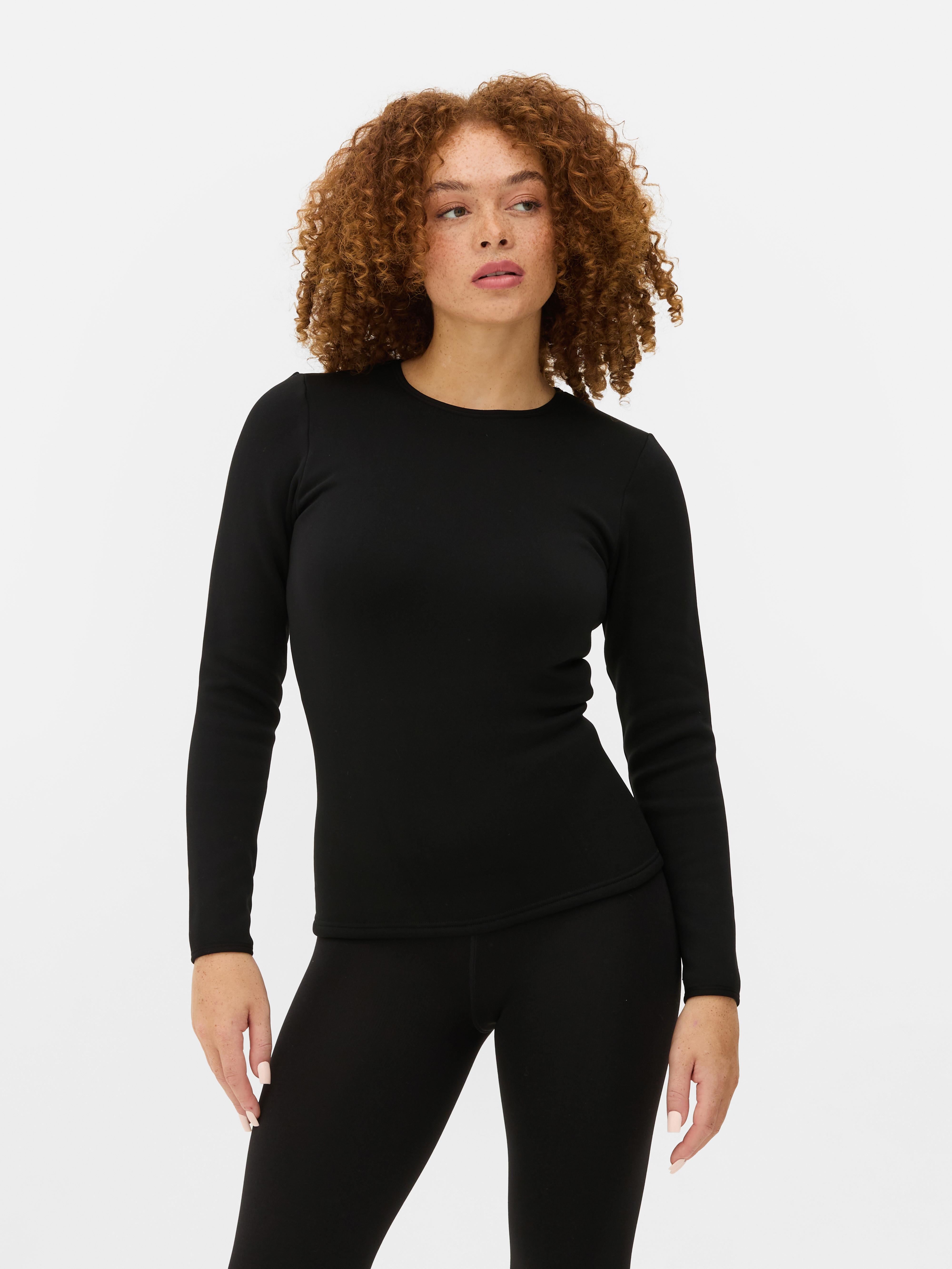 Samtweiches Plüschtop mit langen Ärmeln und Futter. Dieses warm gefütterte Thermotop mit langen Ärmeln ist ein perfektes Basic.
