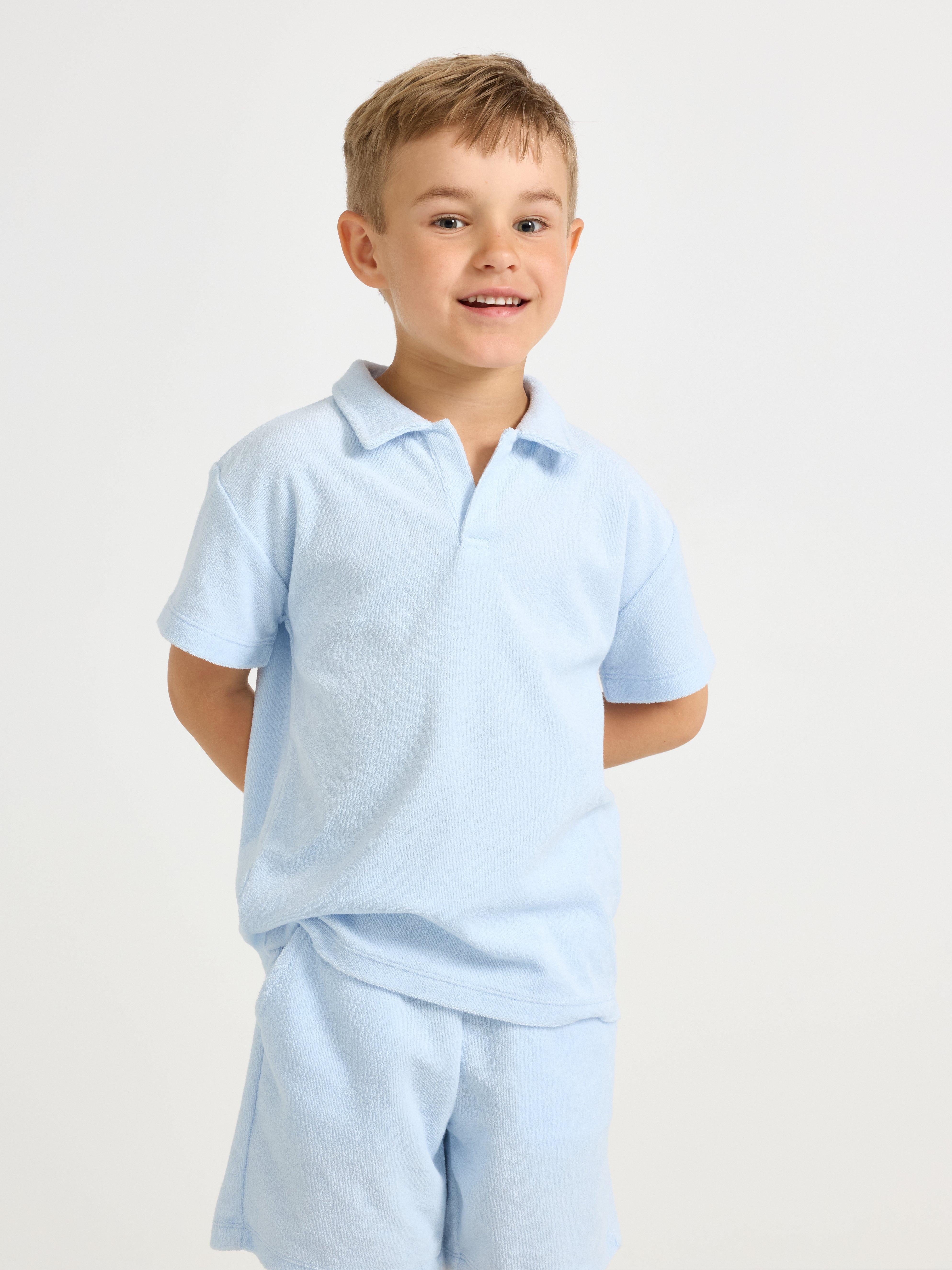 Camisa de manga curta em tecido atoalhado azul claro