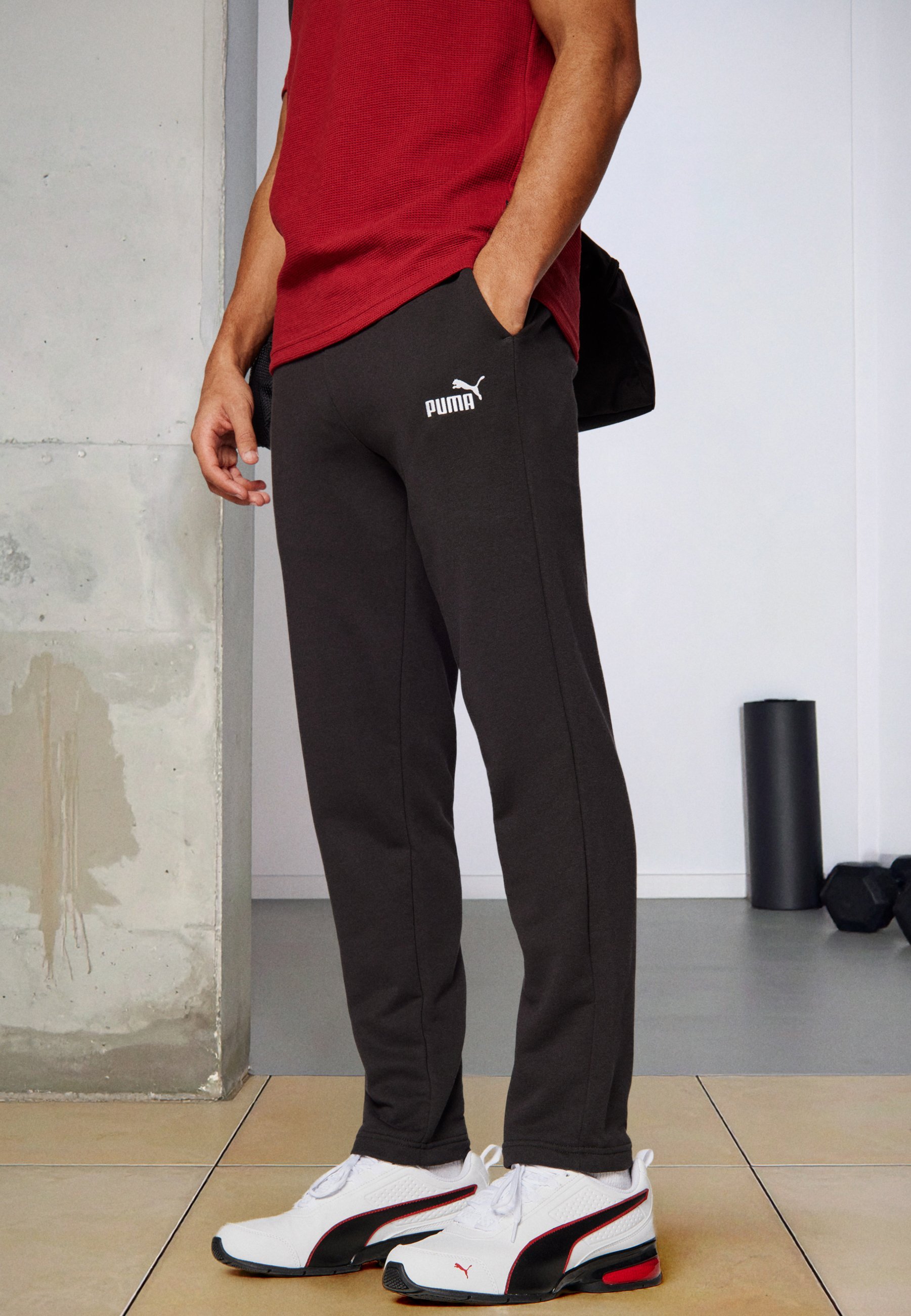 Pantaloni della tuta Puma LOGO - neri